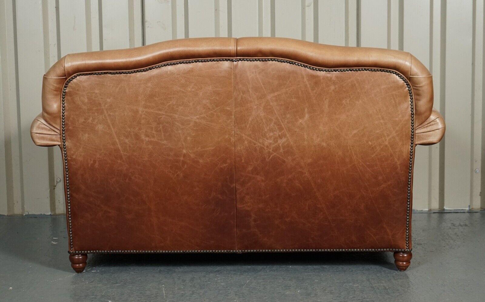 We are so excited to present to you this beautiful Laura Ashley brown leather two seater sofa.

A comfortable sofa, with some wear and minor fading on the back. 

We have lightly restored this by giving it a hand clean all over, hand waxed and