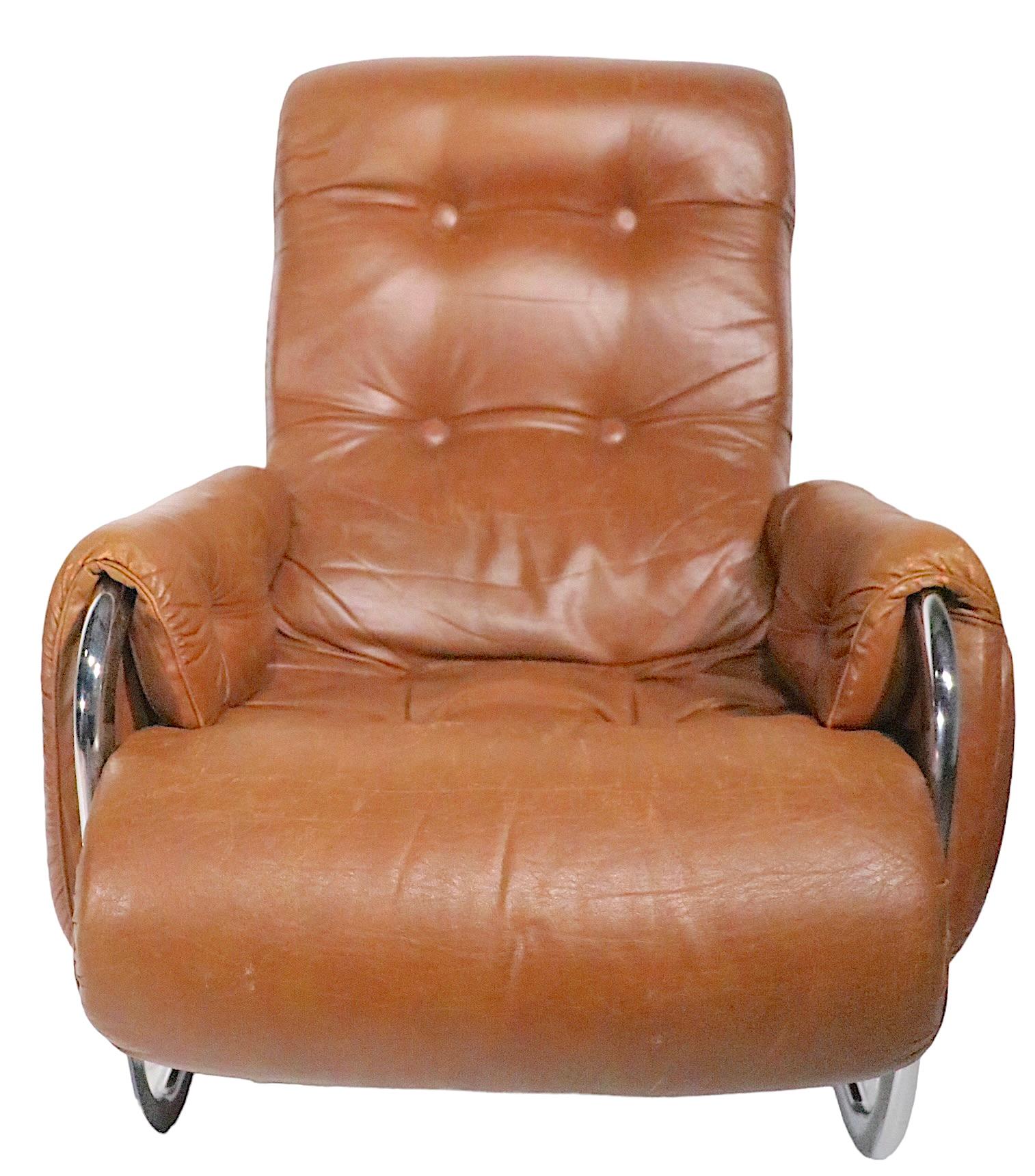 brown chair and ottoman