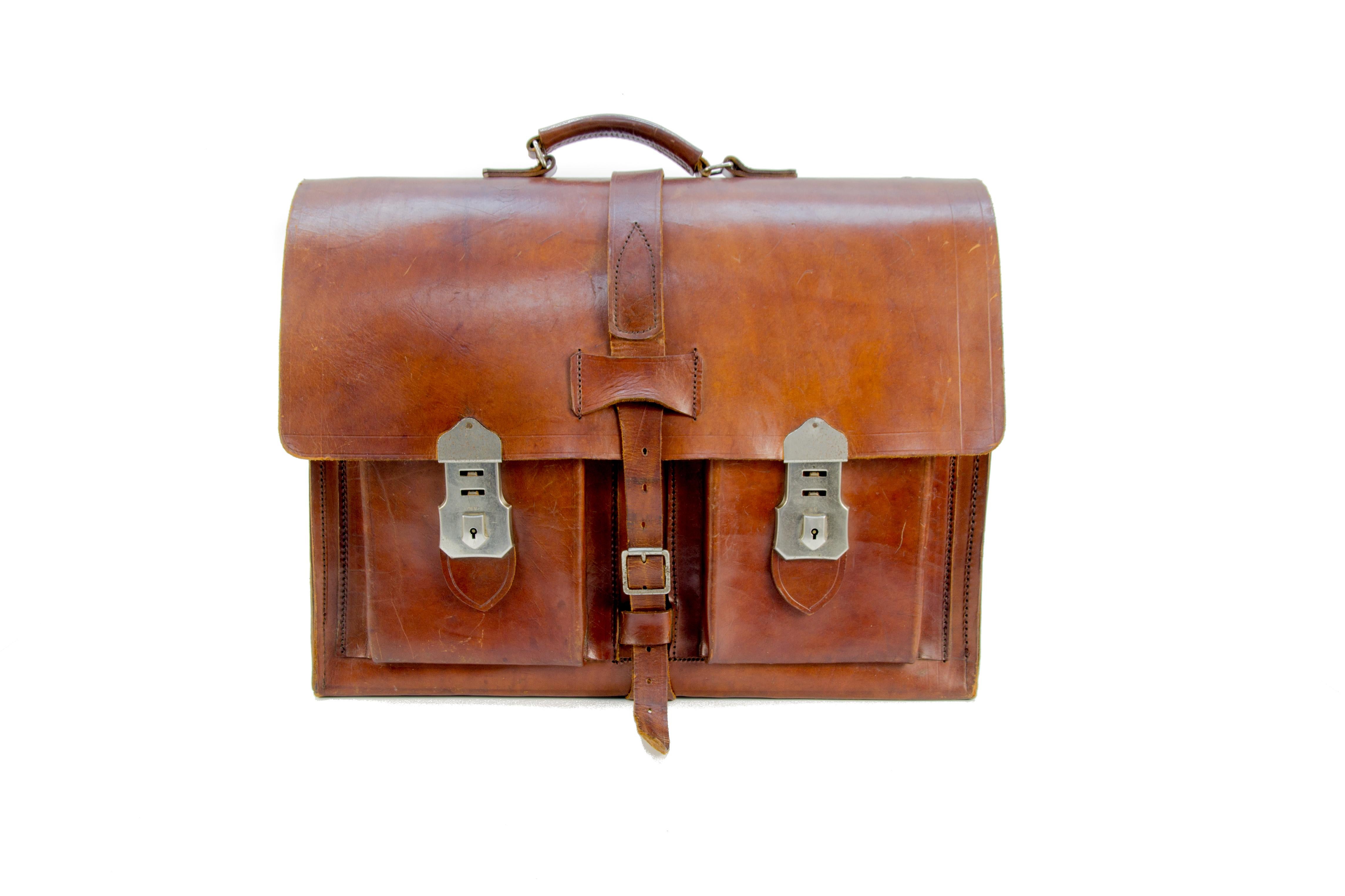 High-quality thick leather briefcase in beautiful brown tones with Cheney locks, the key is not included.
Belgium, the 1960s.
Dimensions:
Width 47 cm / 18.5 in; height 33 cm / 12.99 in; depth 18 cm / 7.08 in.