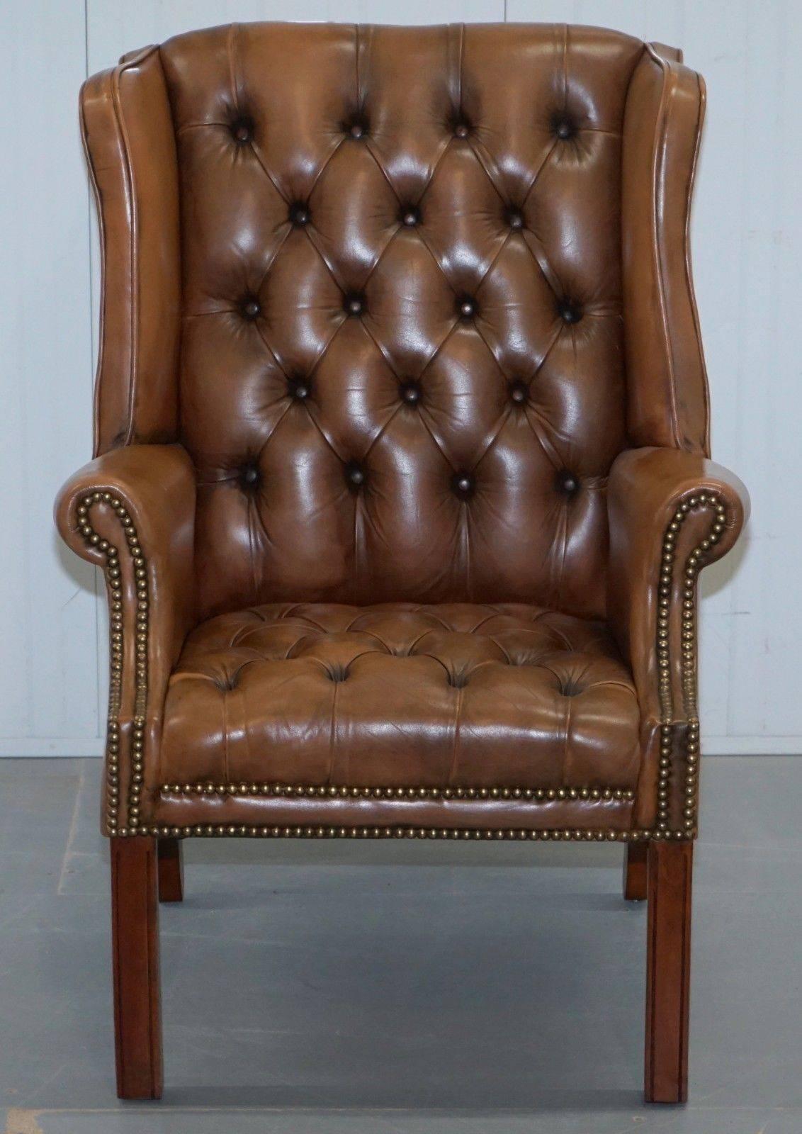 We are delighted to offer for sale this stunning vintage button base and back Chesterfield wingback armchair

A good looking and well-made piece with a lovely comfortable seating position

We have deep cleaned hand condition waxed and hand