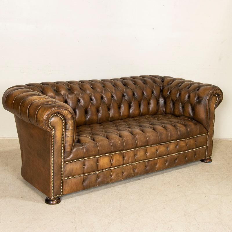 English Vintage Brown Leather Chesterfield Sofa and Pair of Chesterfield Club Chairs, En