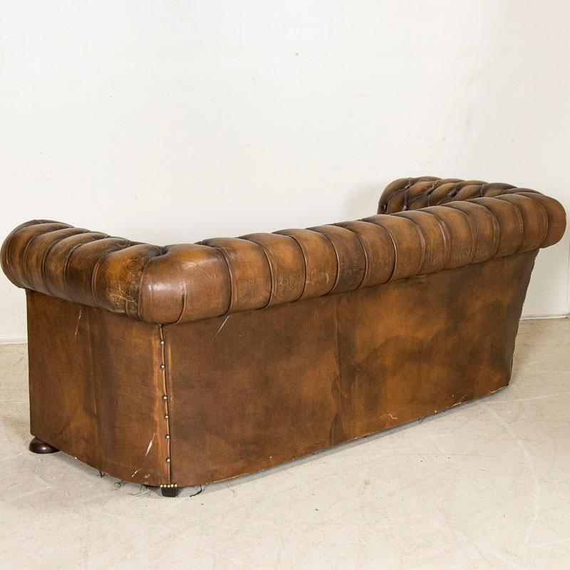 20th Century Vintage Brown Leather Chesterfield Sofa and Pair of Chesterfield Club Chairs, En