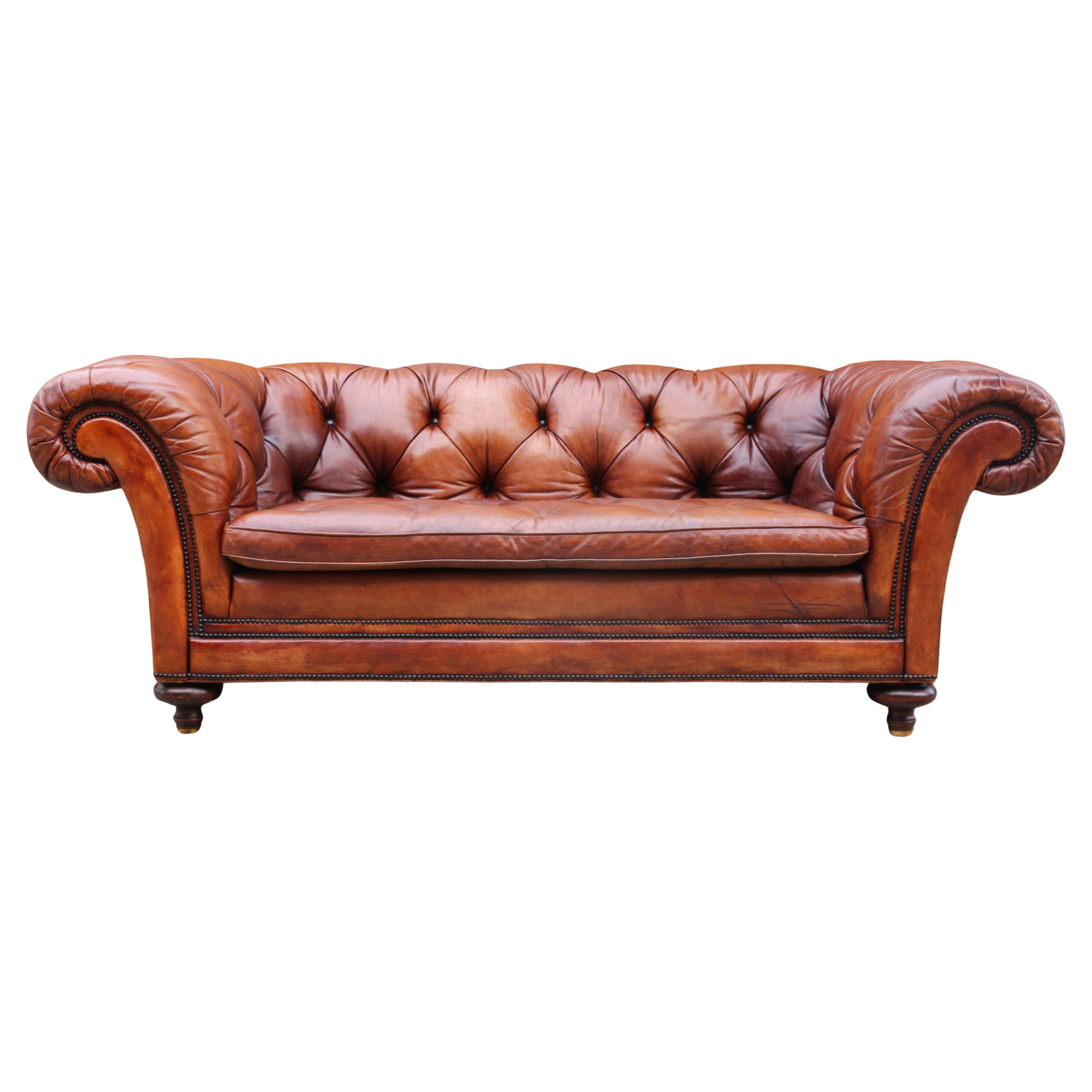 Sofá Chesterfield vintage de cuero marrón de Baker Furniture, circa años 50