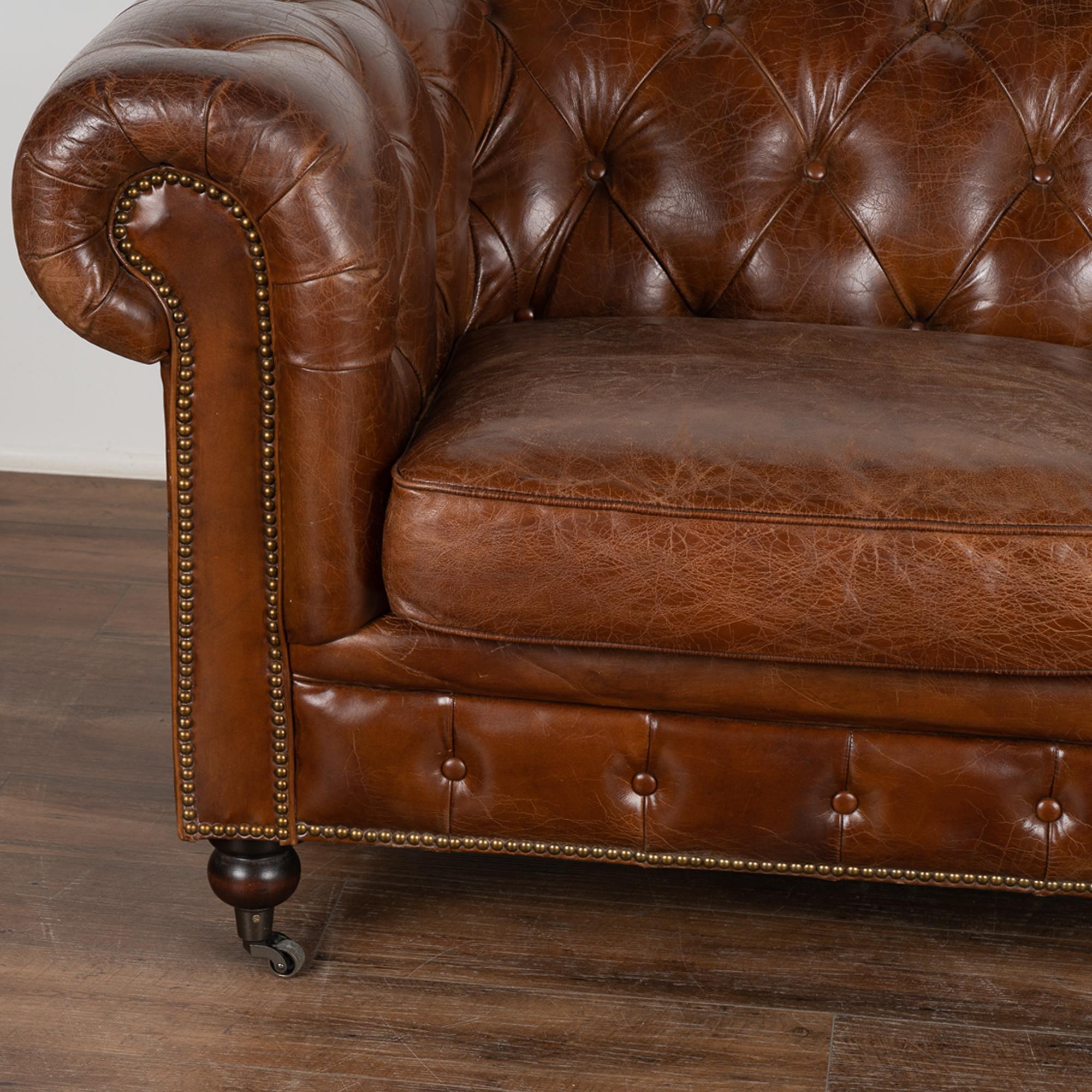 Vintage Brown Leather Chesterfield Two Seat Sofa Loveseat, England circa 1960-80 In Good Condition In Round Top, TX