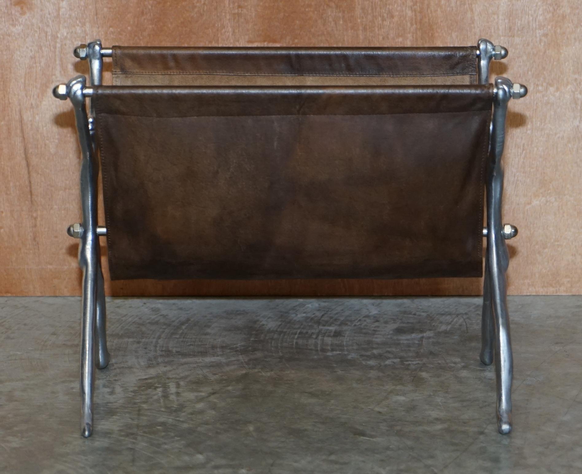 We are delighted to offer for sale this lovely highly sculptural Carrol Boyes vintage saddle brown leather and chrome magazine newspaper rack

A highly decorative and well made piece that looks amazing from every angle

Its in good vintage order