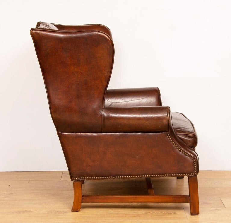 Vintage Brown Leather Hide Wing Chair at 1stDibs