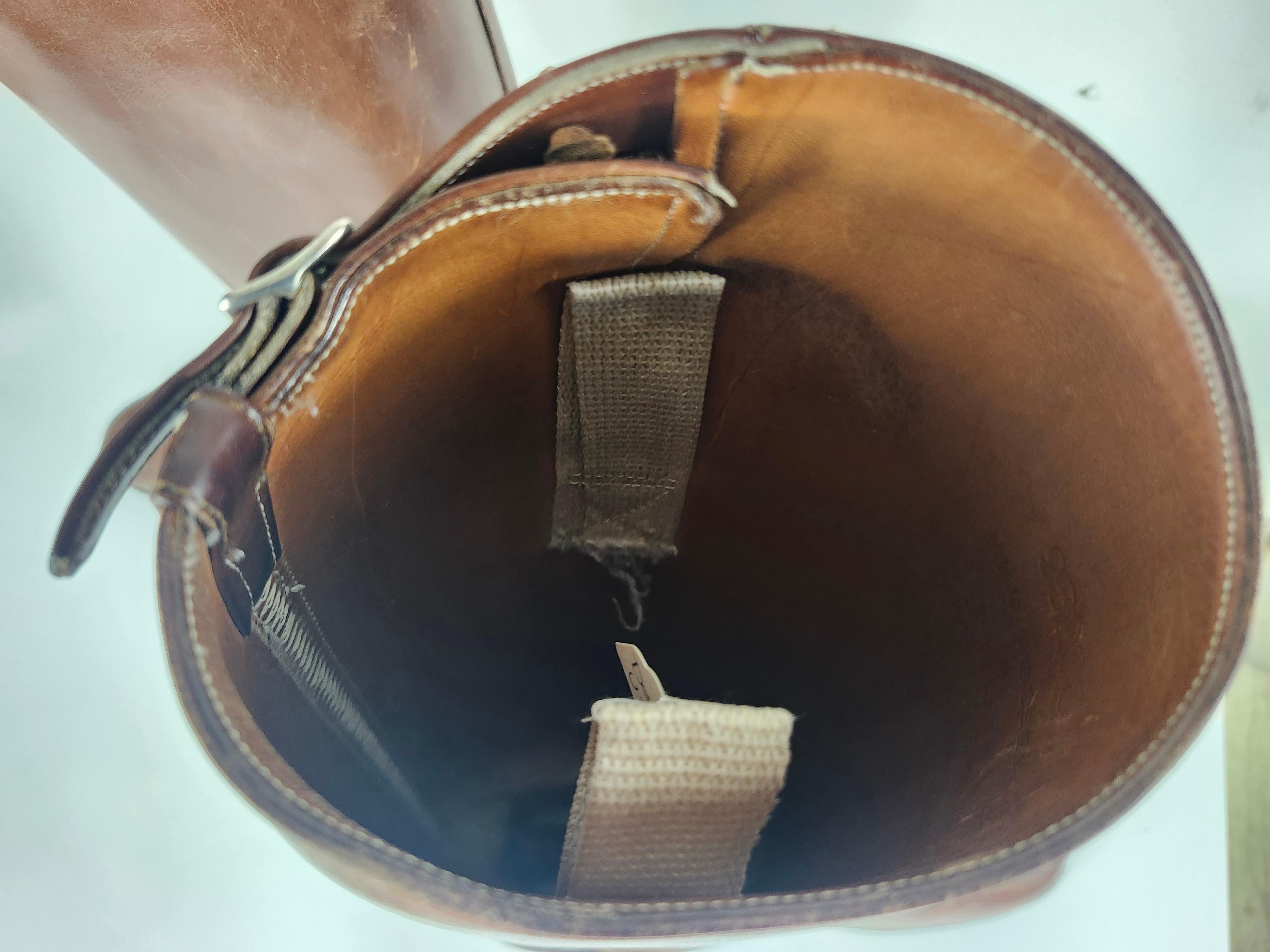 Pair of tall leather riding boots. Told they are a size 10.5 no marking found to support that. Almost 12 inches in length. In excellent vintage condition with minimal wear from age and use.  Well tahen care of.
Two other pairs to follow from the