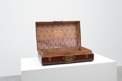Vintage brown leather suitcase with copper details, China 1900s
