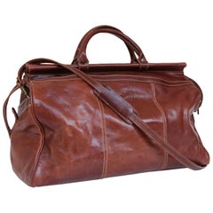 Bolsa de viaje vintage de piel marrón con correa para el hombro,  Florencia, Italia