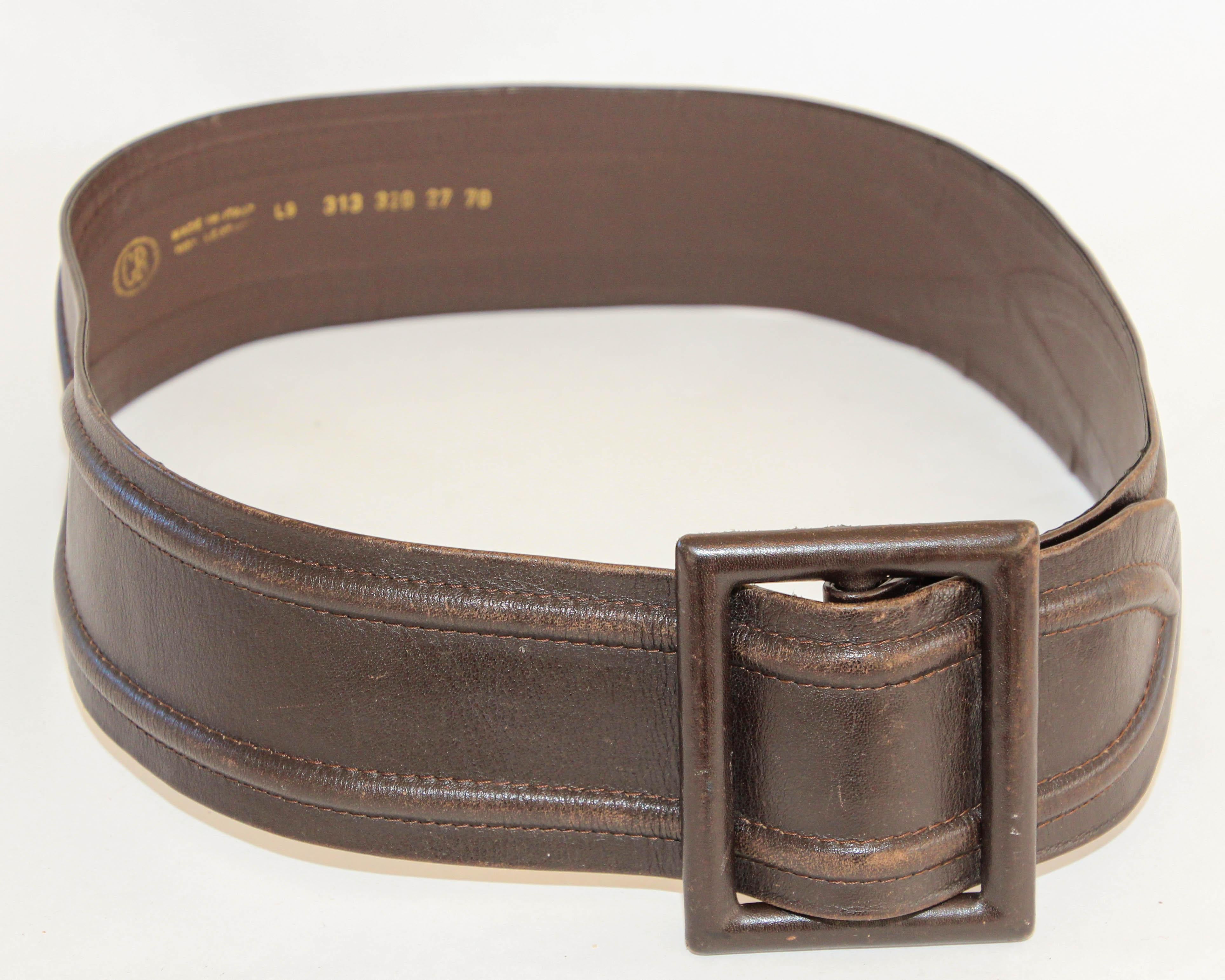 Vintage brown leather wide belt women 1980's.
The waist belt with leather buckle handmade in Italy.
Vintage over garment wide leather belt, great statement fashionable 80's style.
Various sizes possible. Marked 27 inch US or 70 cm EU.
Hallmark with