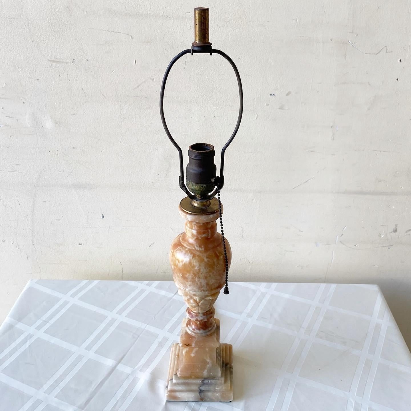 Exceptional vintage brown alabaster table lamp. Features an ornate hand carved and polished design.
 