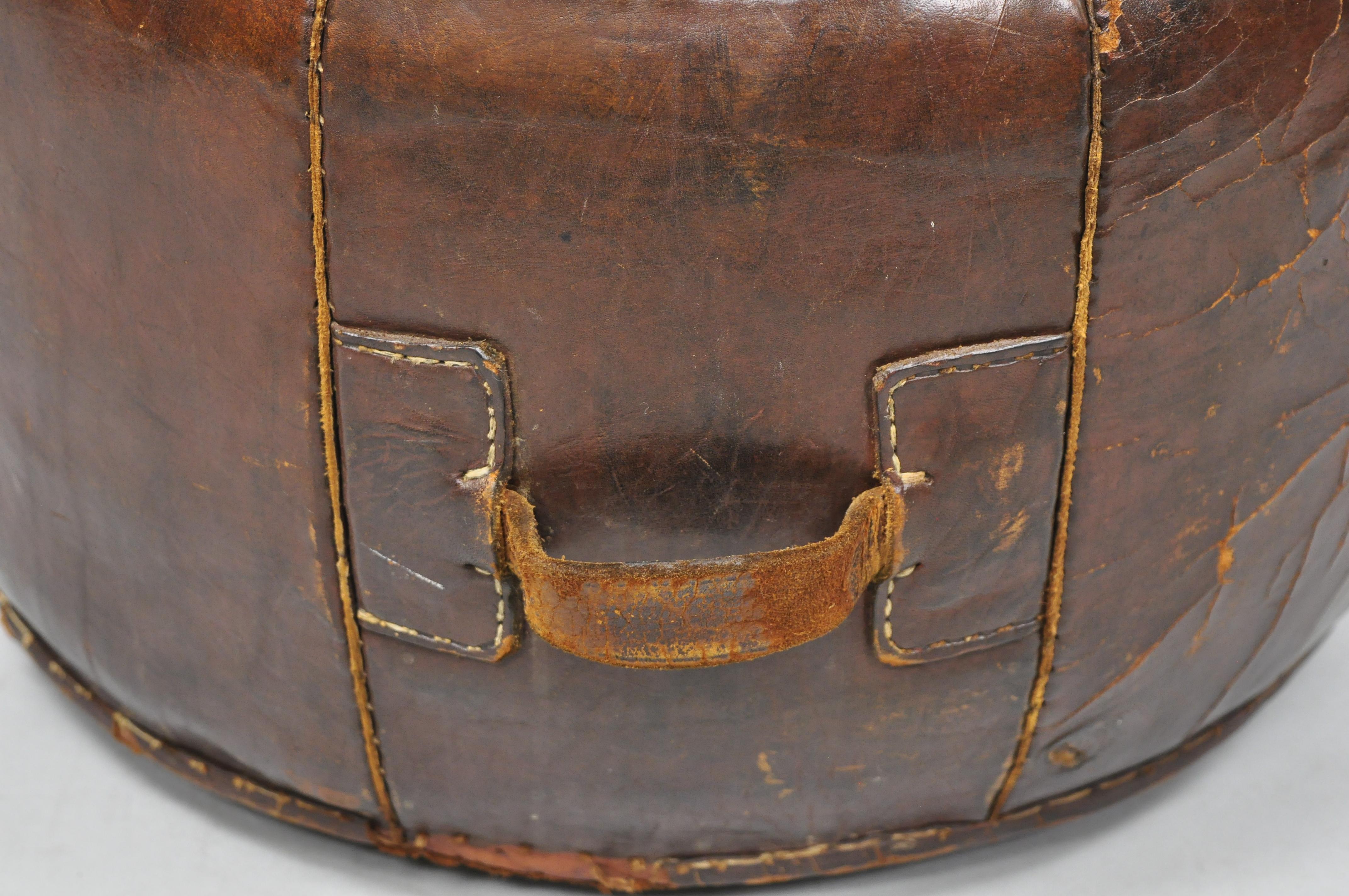 20th Century Vintage Brown Tooled Saddle Leather Peruvian Ottoman Hassock with Handle