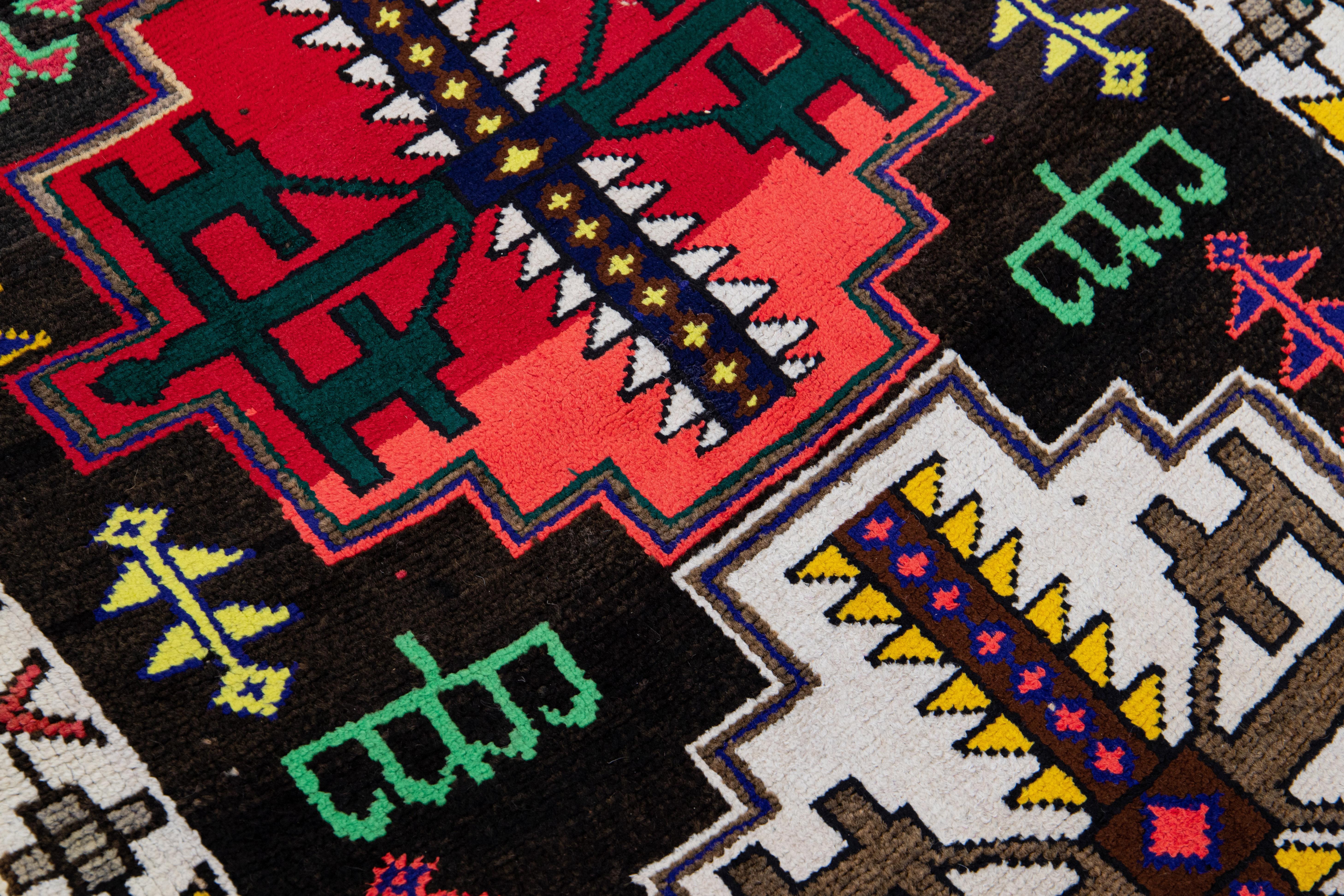 20th Century Vintage Brown Turkish Handmade Multicolor Tribal Pattern Wool Runner For Sale