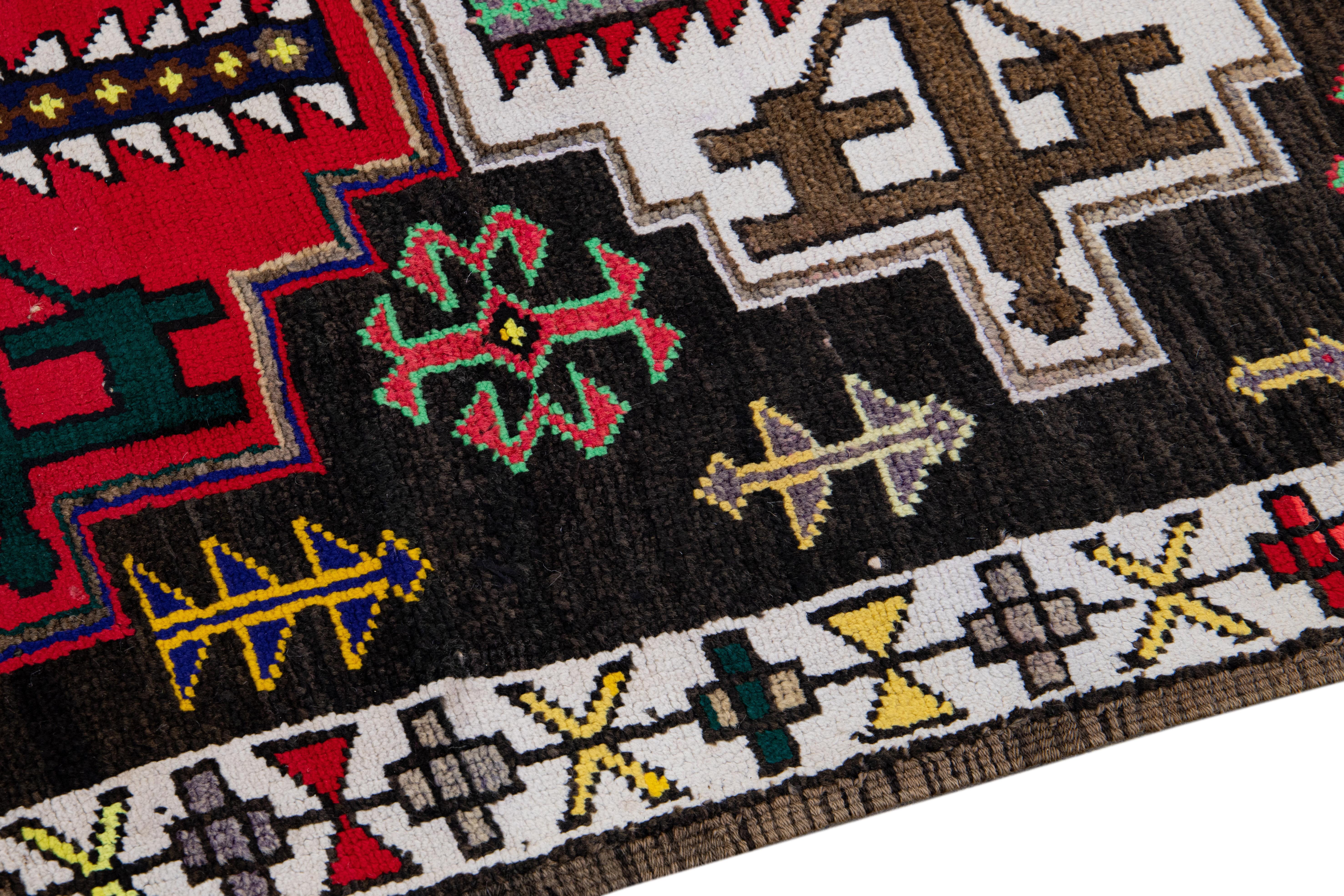 Vintage Brown Turkish Handmade Multicolor Tribal Pattern Wool Runner For Sale 1