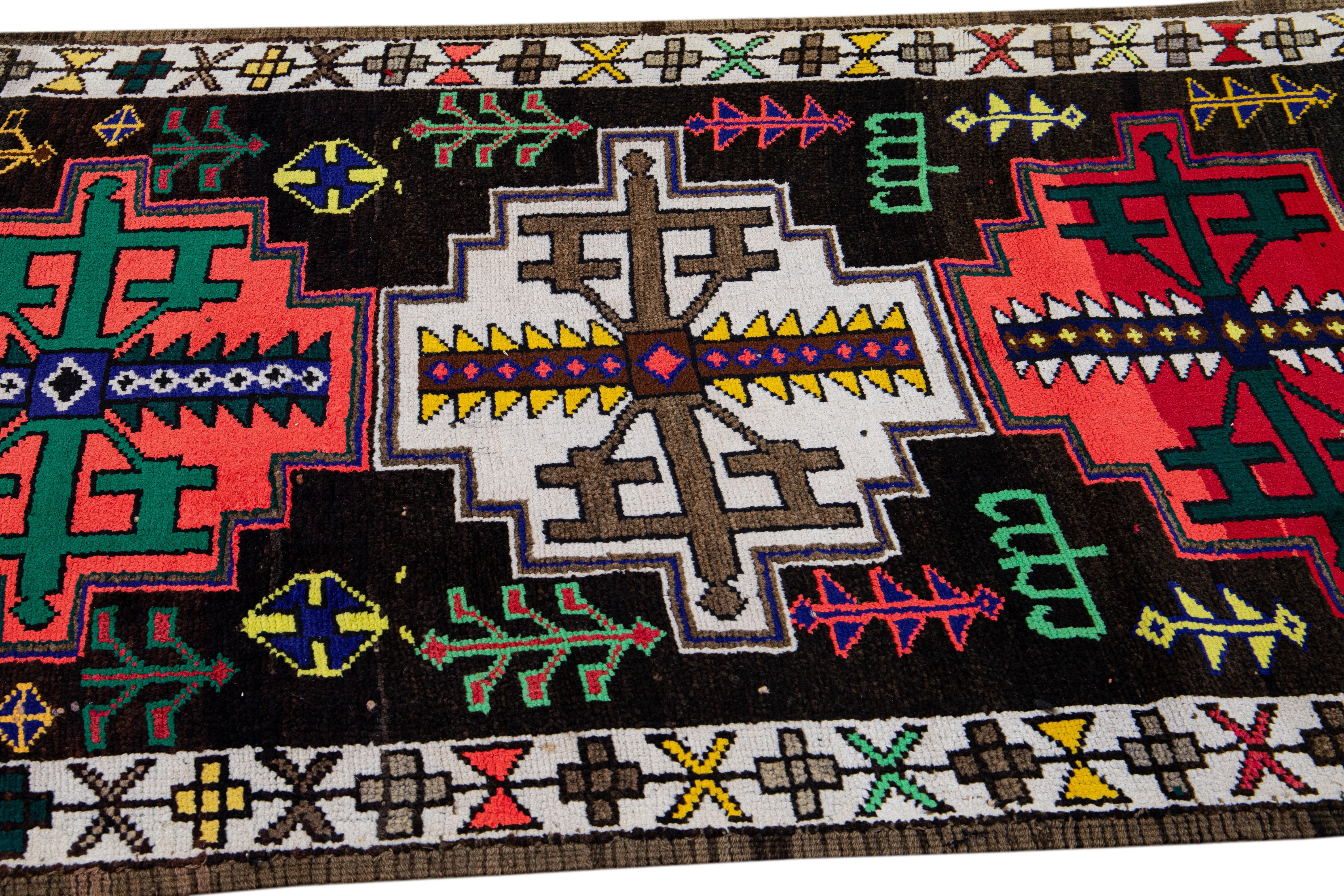 Vintage Brown Turkish Handmade Multicolor Tribal Pattern Wool Runner For Sale 2