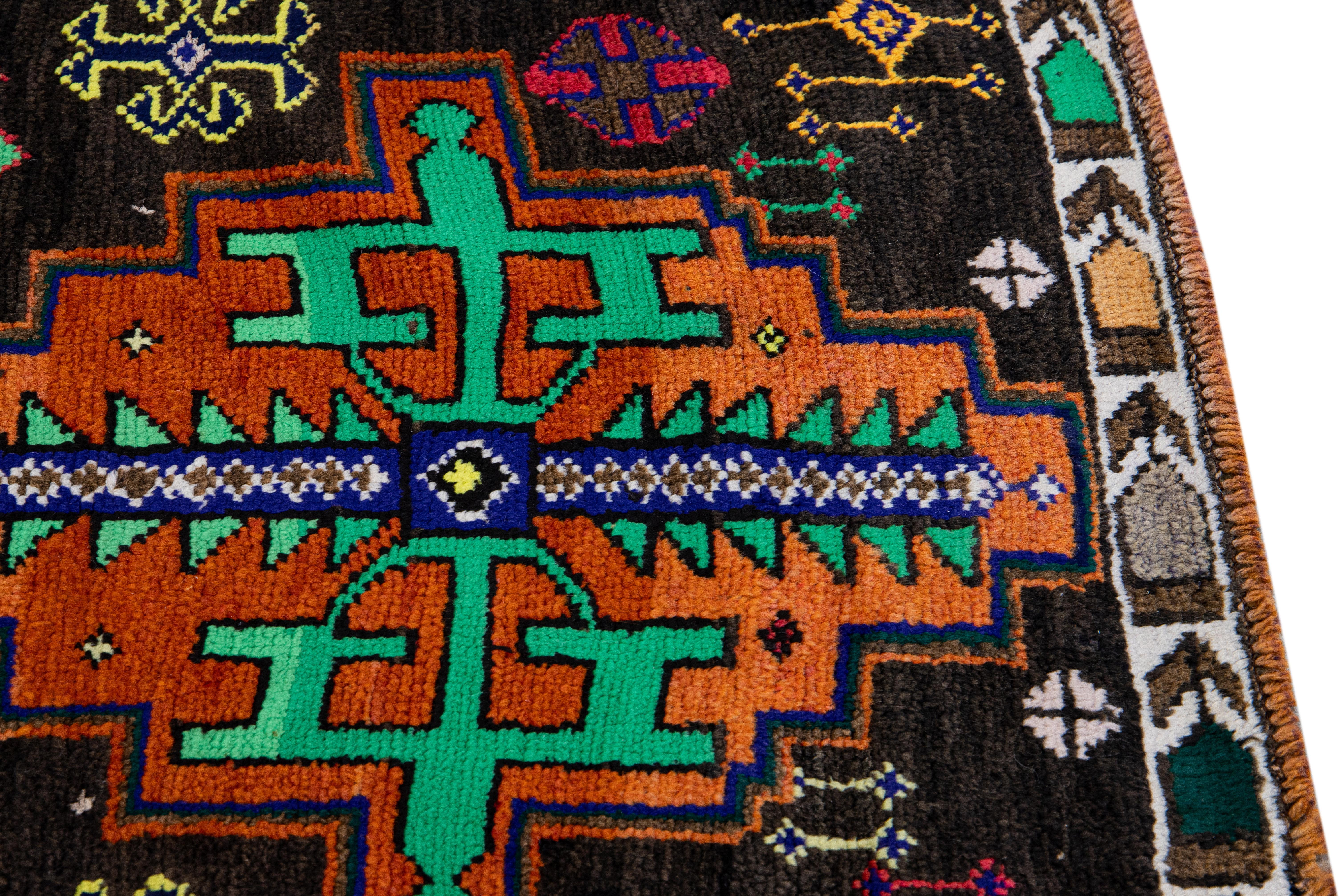 Vintage Brown Turkish Handmade Multicolor Tribal Pattern Wool Runner For Sale 3