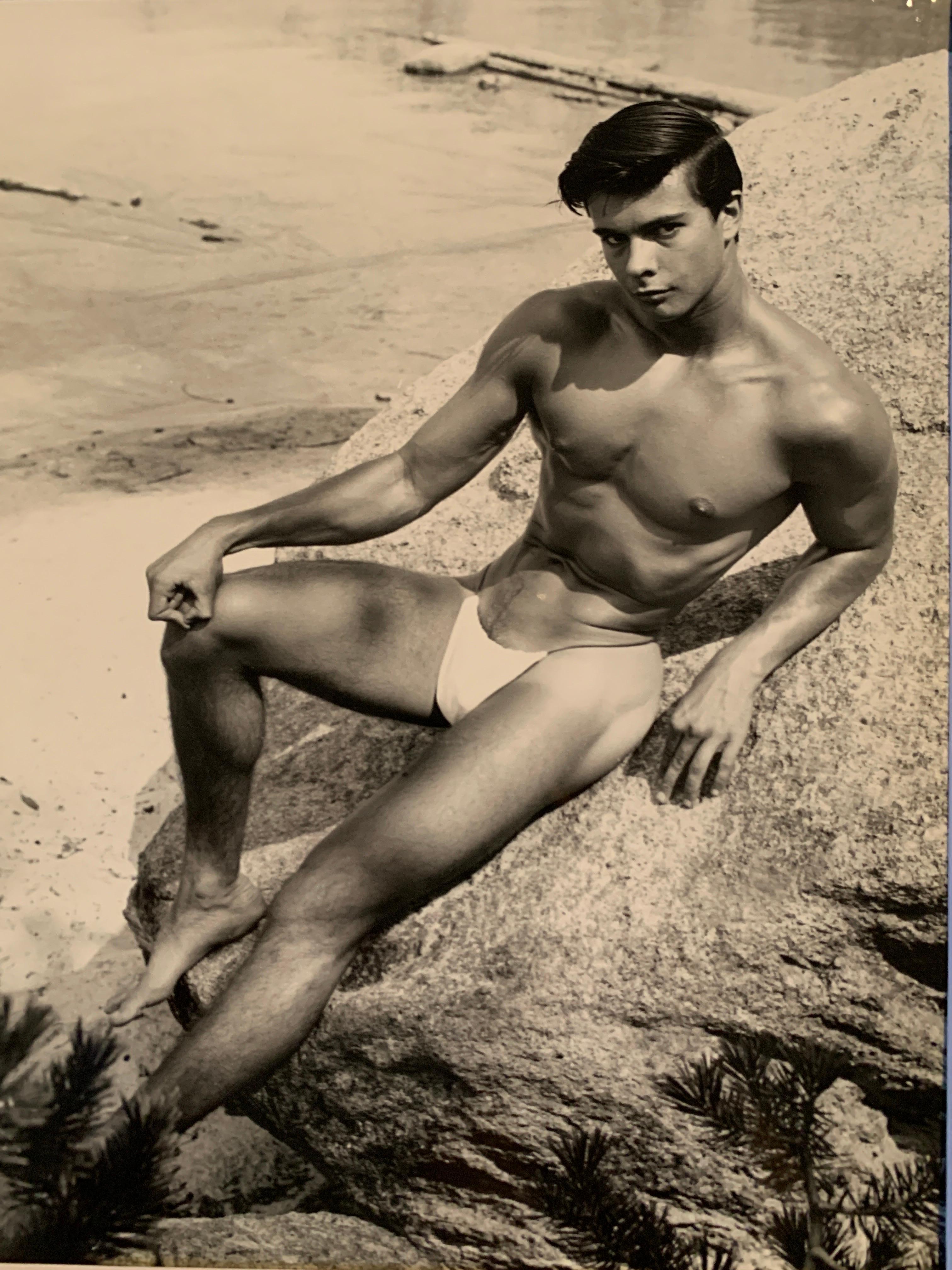 It is very rare to find a desirable iconic two piece set of original Bruce of Los Angeles vintage photographs. Especially with the iconic beach ball prop, and hands down, one of Bruce of LA ‘s favorite and best looking male models Edgar Hayes. This