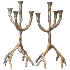 Vieille paire de candélabres en aluminium brossé avec branches d'arbre