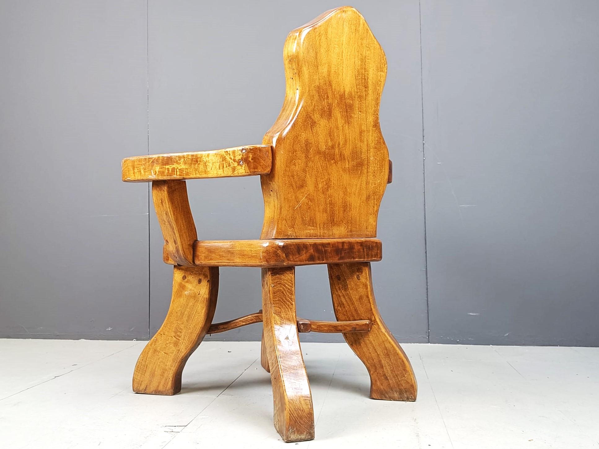 Sturdy solid oak brutalist armchairs.

These armchairs are surely the most solid we've ever seen. Thick pieces of oak have been used to create these ever lasting armchairs. 

They are very well crafted with, as a beautiful detail, the bent wood