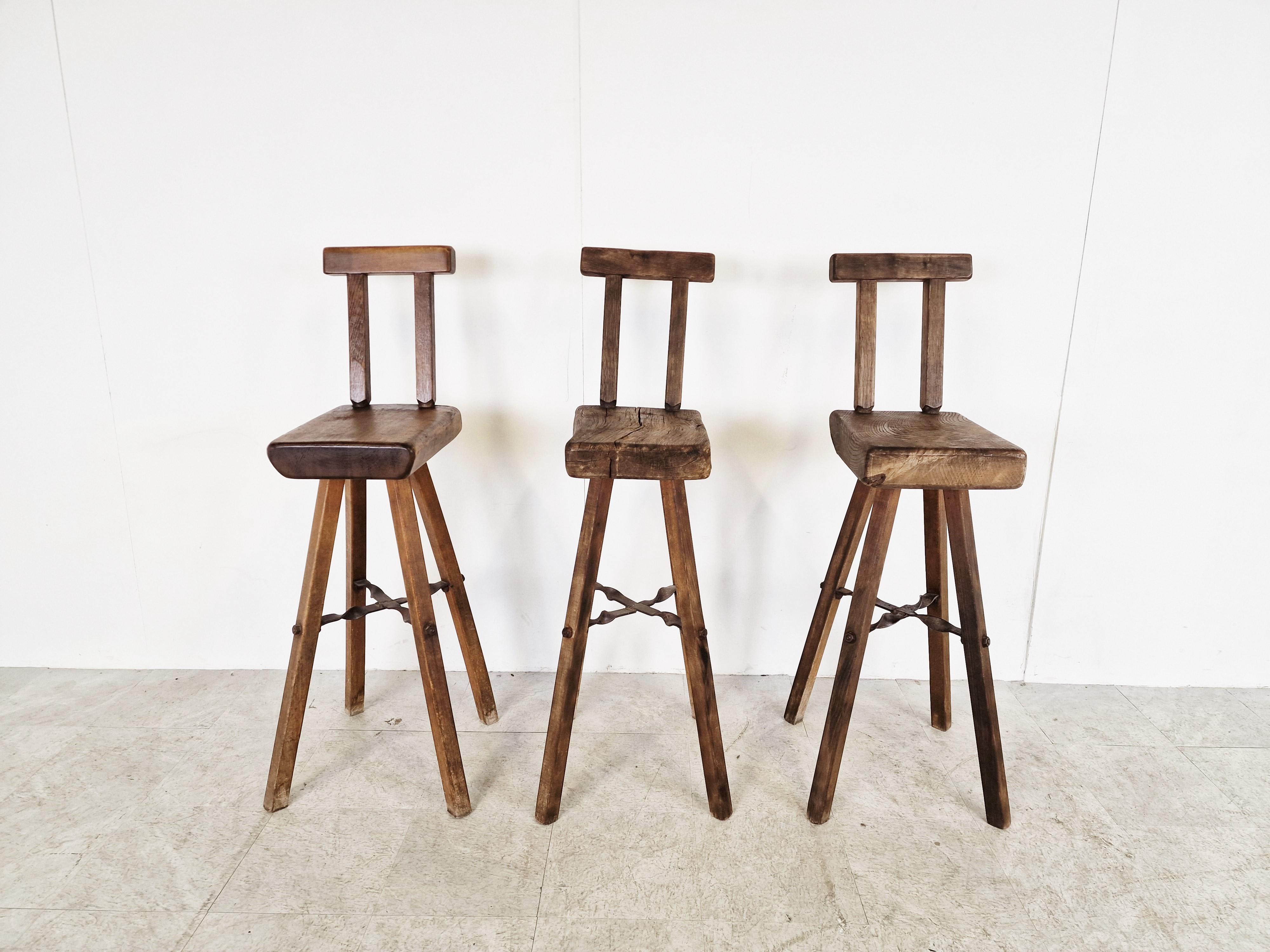 Attractive hand crafted brutalist bar stools.

The stools are very sturdy and made from thick oak.

Good original condition.

1960s - Belgium

Dimensions:
Width: 32cm/12.59