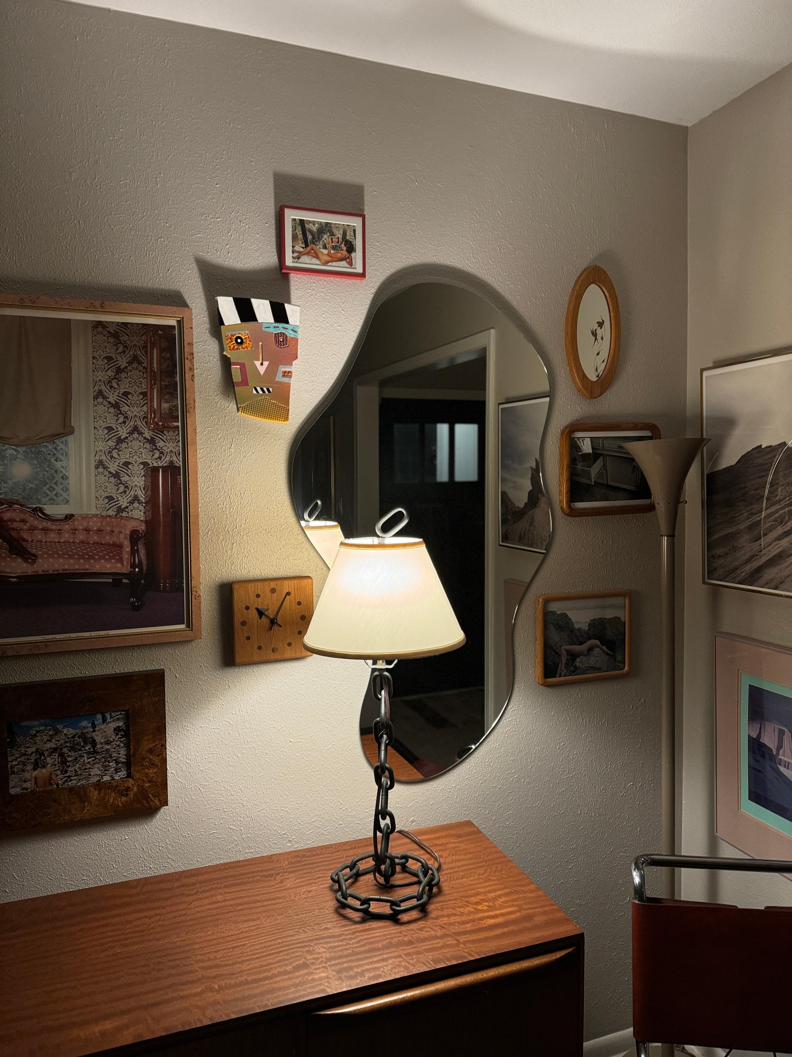 Stunning vintage brutalist chain link lamp in the style of Franz West, circa 1970s. Lamp shade is not original to the lamp. Overall in very good condition. 

29” H 9” W x 9” D
With lamp shade 12” W