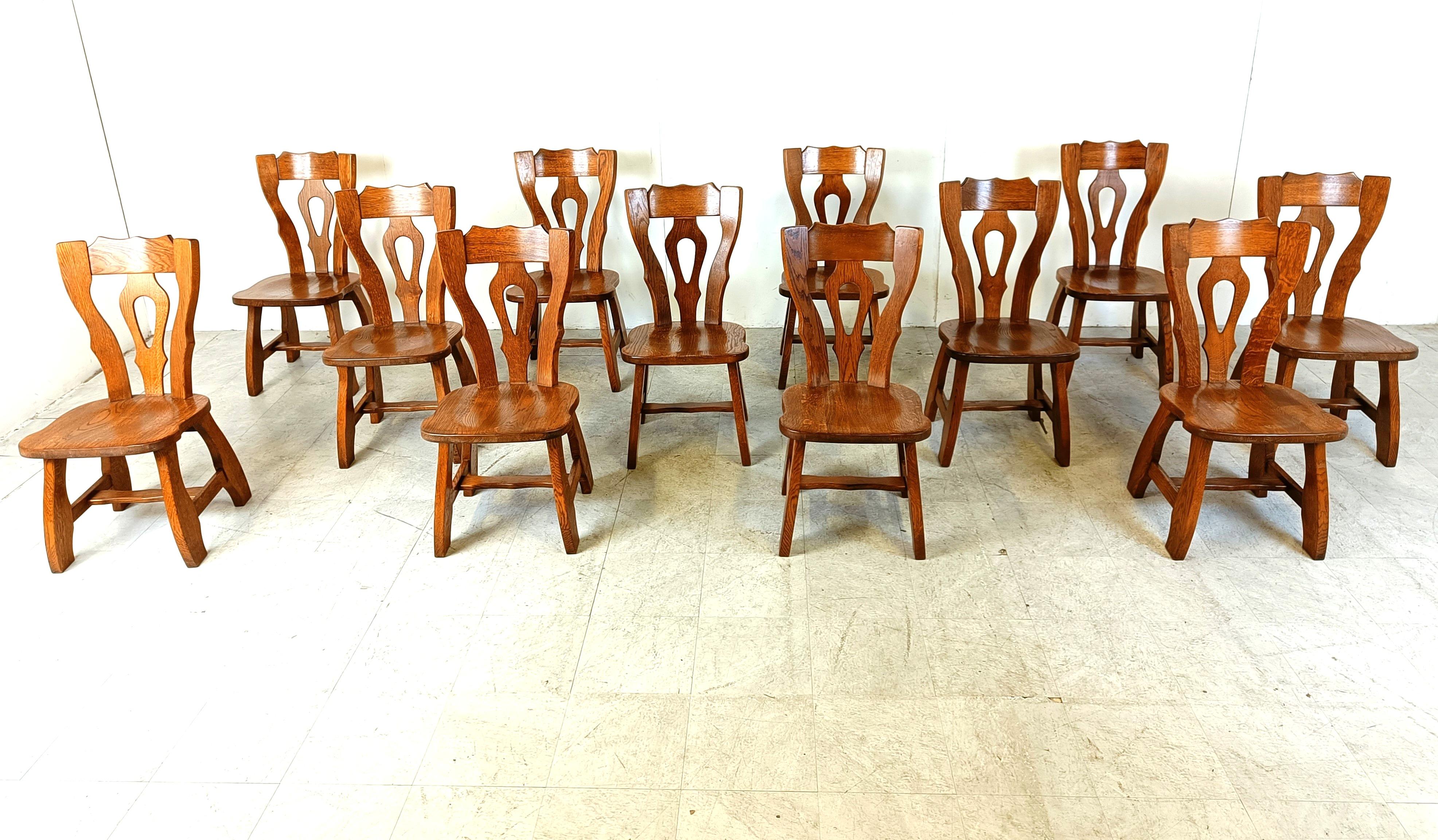 Mid century solid wooden  brutalist dining chairs, big set of 12 chairs

Nice rustic design.

Very sturdy chairs

Good original condition.

1960s - Germany

Dimensions:
Height: 94cm
Seat height: 45cm
Width: 45cm
Depth: 55cm

Ref.: 201044