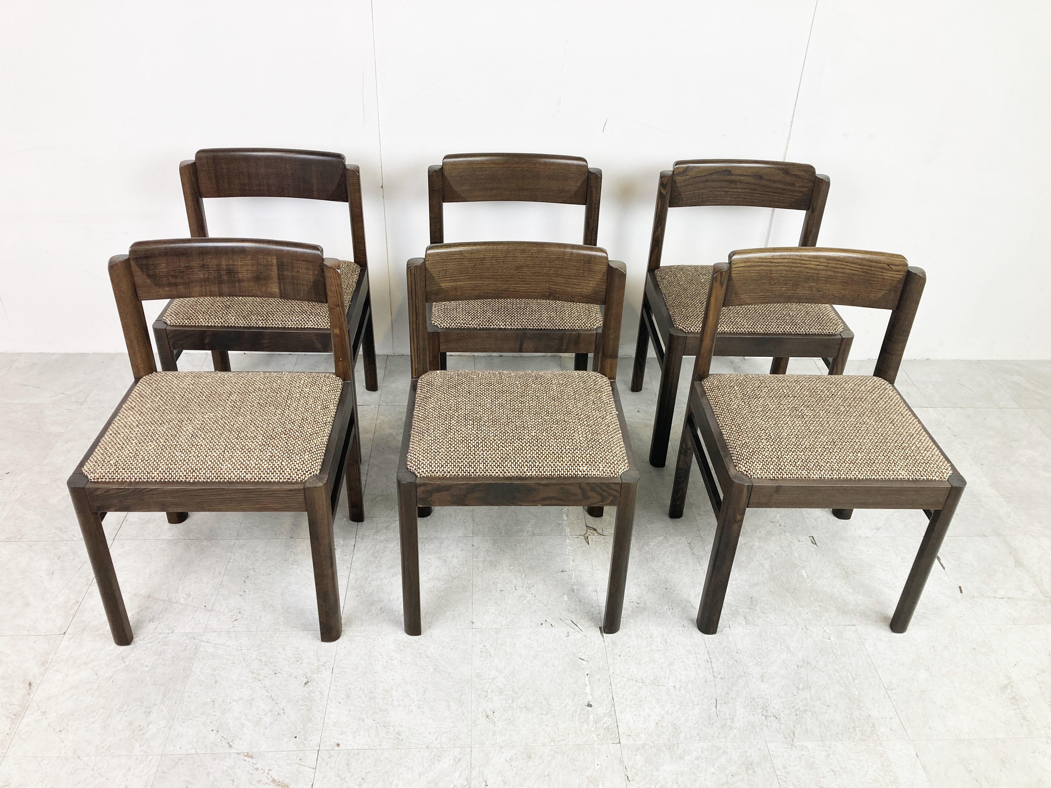 Midcentury Brutalist dining chairs with their original grey fabric upholstery.

Very sturdy chairs with a nice design.

Good original condition.

1970s - Germany

Dimensions:
Height: 79cm/31.10