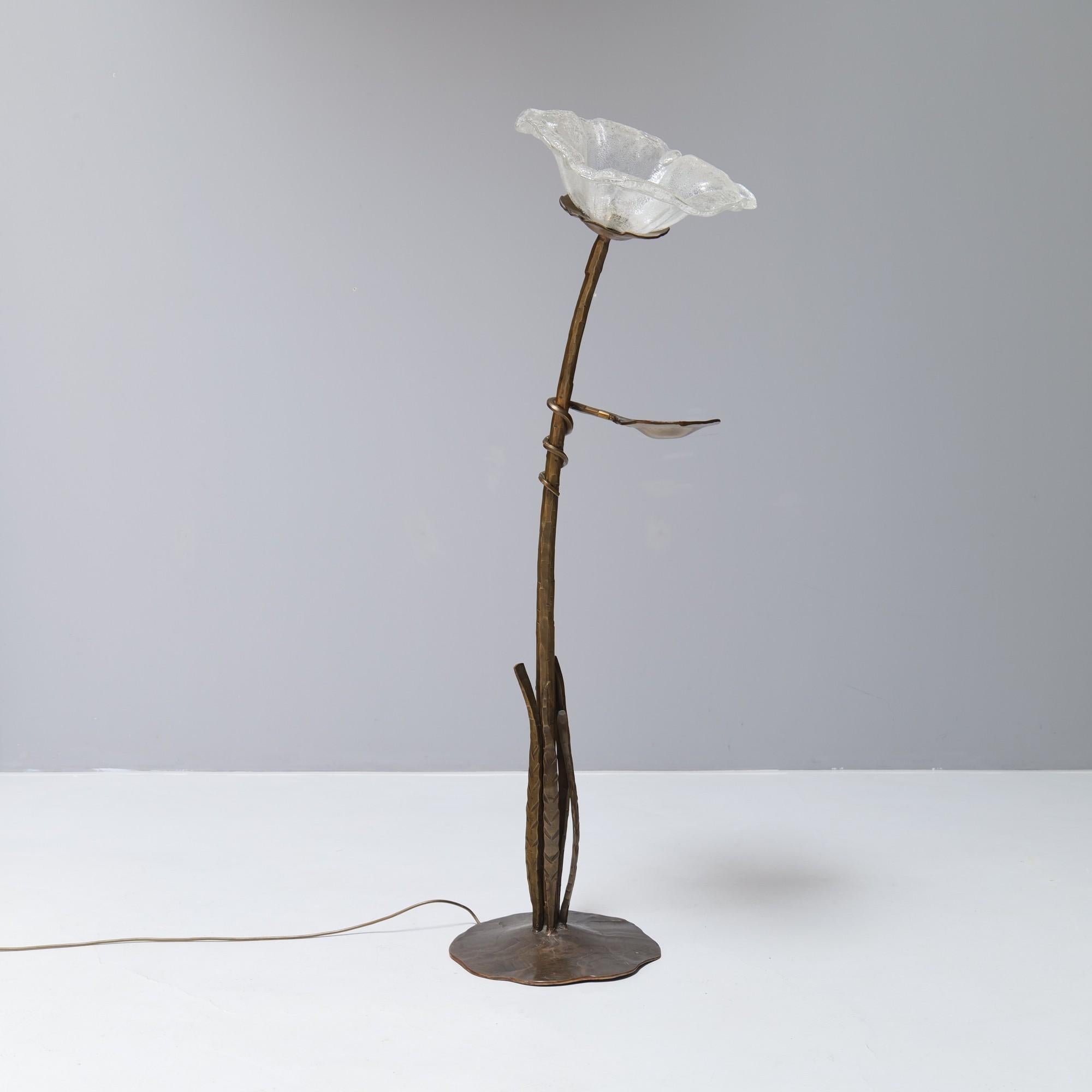 Imposant brutalist floor lamp made out of bronze and glass.
Very good condition without damages.

1980-s Germany