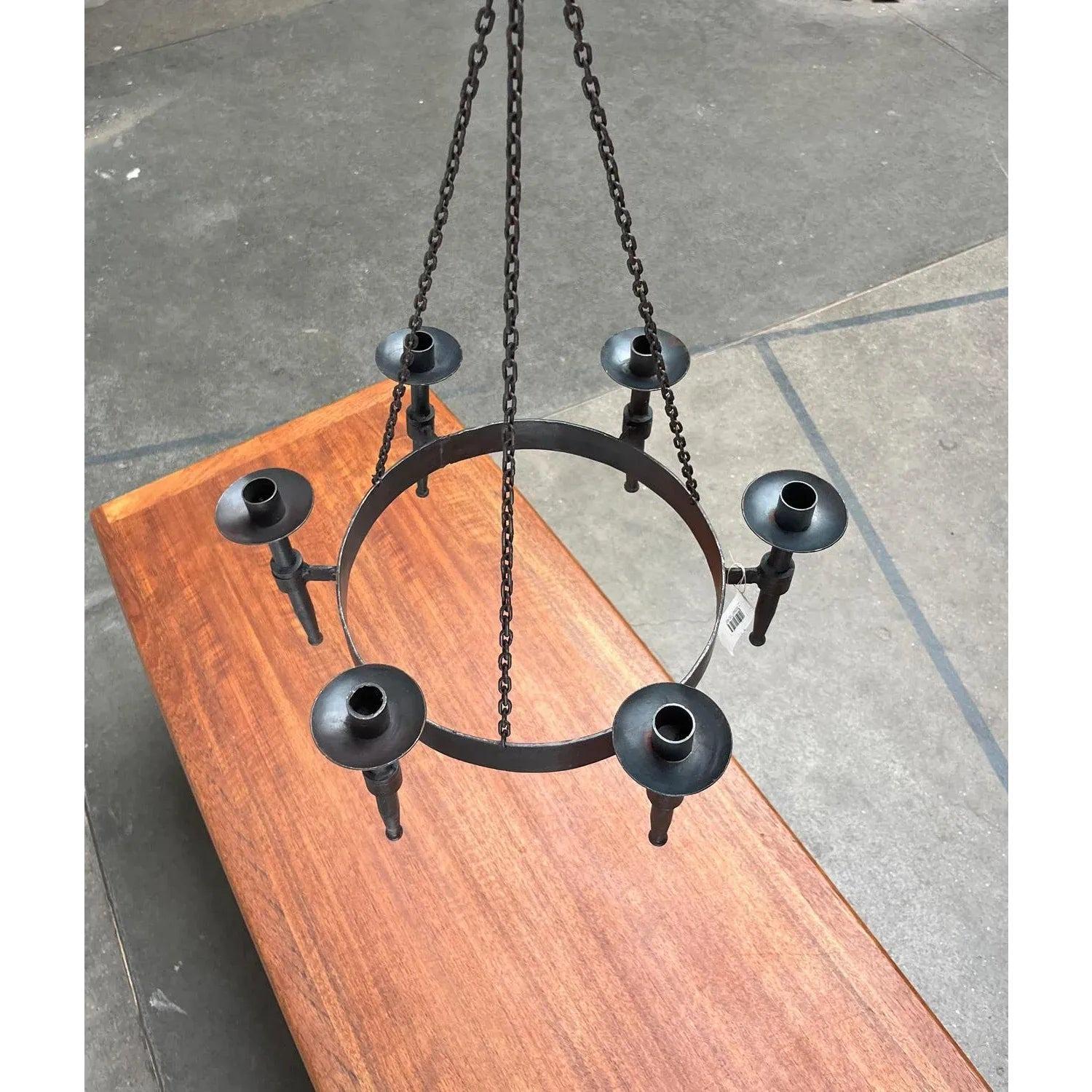 Vintage Brutalist Handmade Candle Chandelier in Wrought Iron from Boltze, 1970s, in Very Good conditions. Designed 1970 to 1979 This piece has an attribution mark, Up to 250V (Europe/UK Standard).The wiring of this item may be original and might
