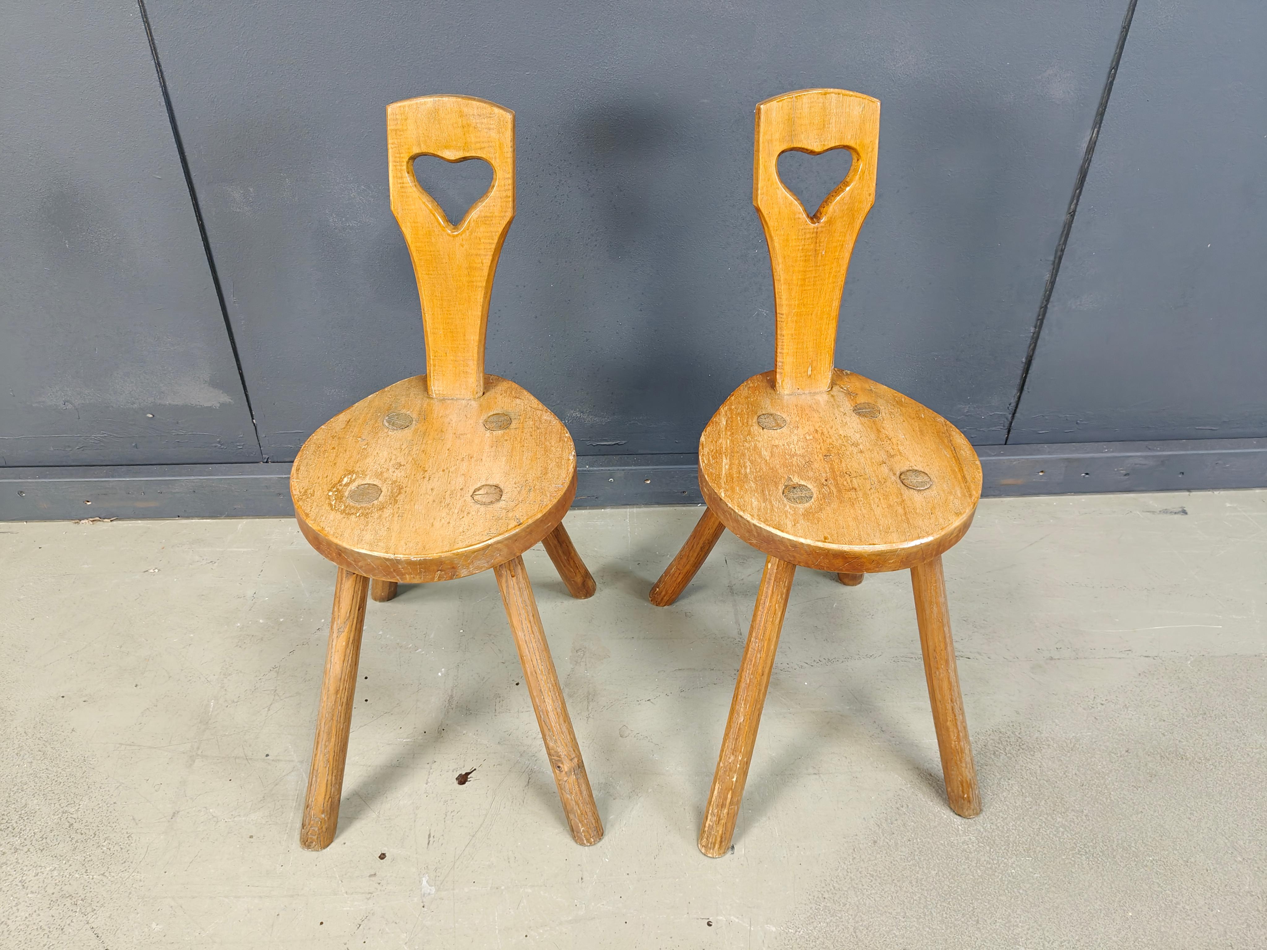 Unique brutalist hand crafted dining chairs.

Sturdy frames with a nice rustic design.

Made from stained oak. 

1960s - Probably from Sweden

Good condition with a nice patina

Dimensions:
Height: 75cm
Width: 40cm
Depth: 40cm
Seat height: