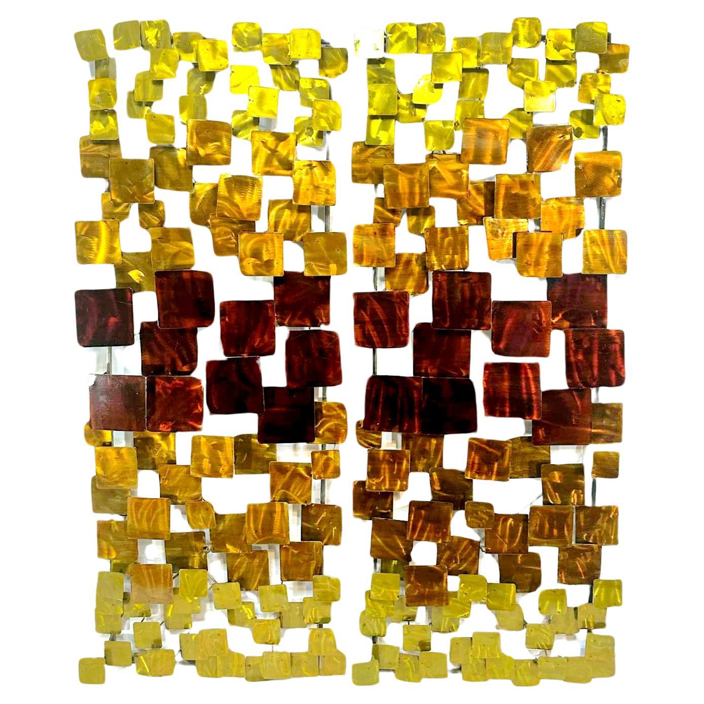 Vintage brutalist metal wall sculptures in the style of Curtis Jere, a pair