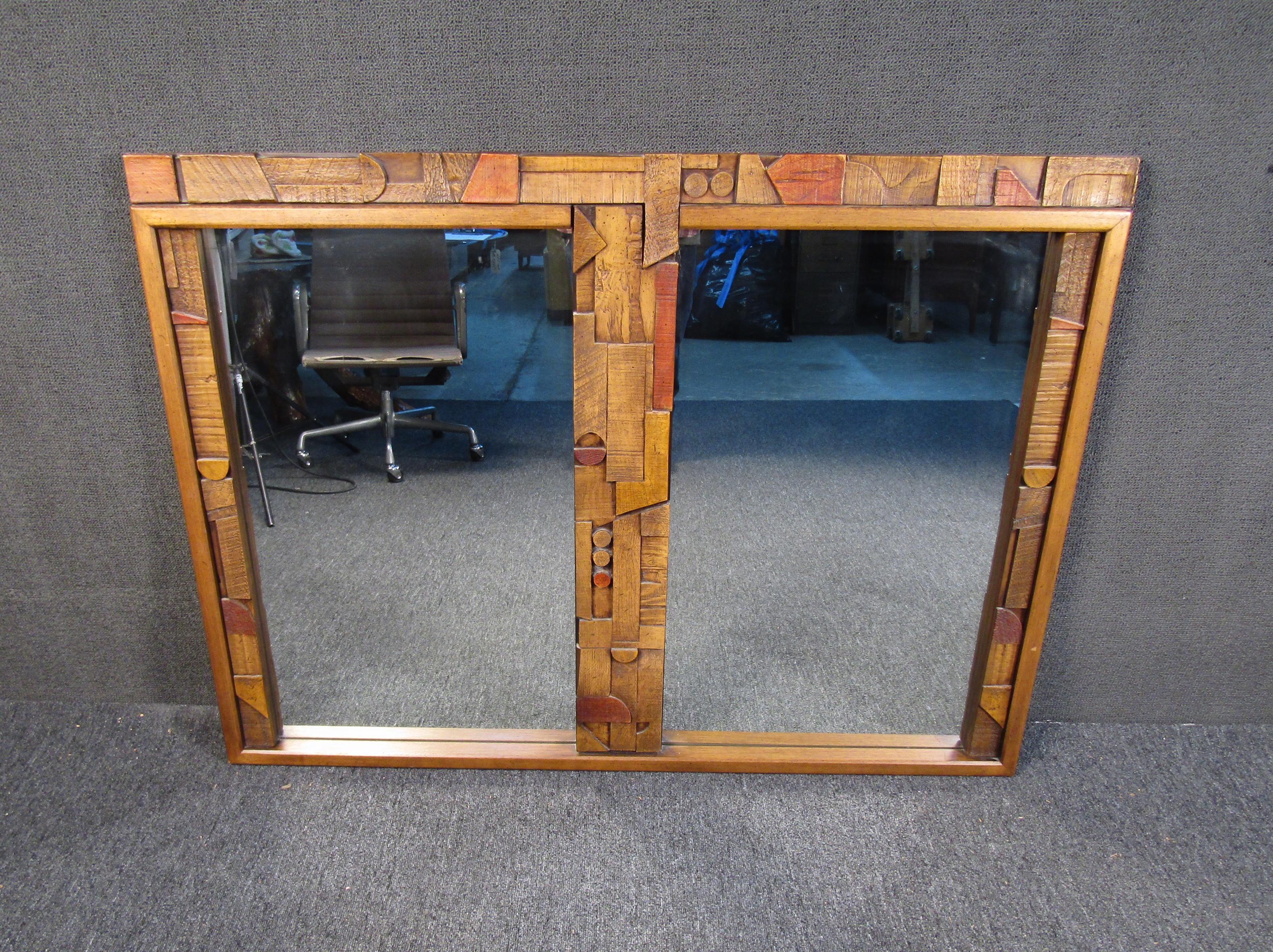 Brutalist mirror by Lane Furniture that is sure to add character to any room with its eye-catching assortment of sculpted details. Please confirm item location with seller (NY or NJ).