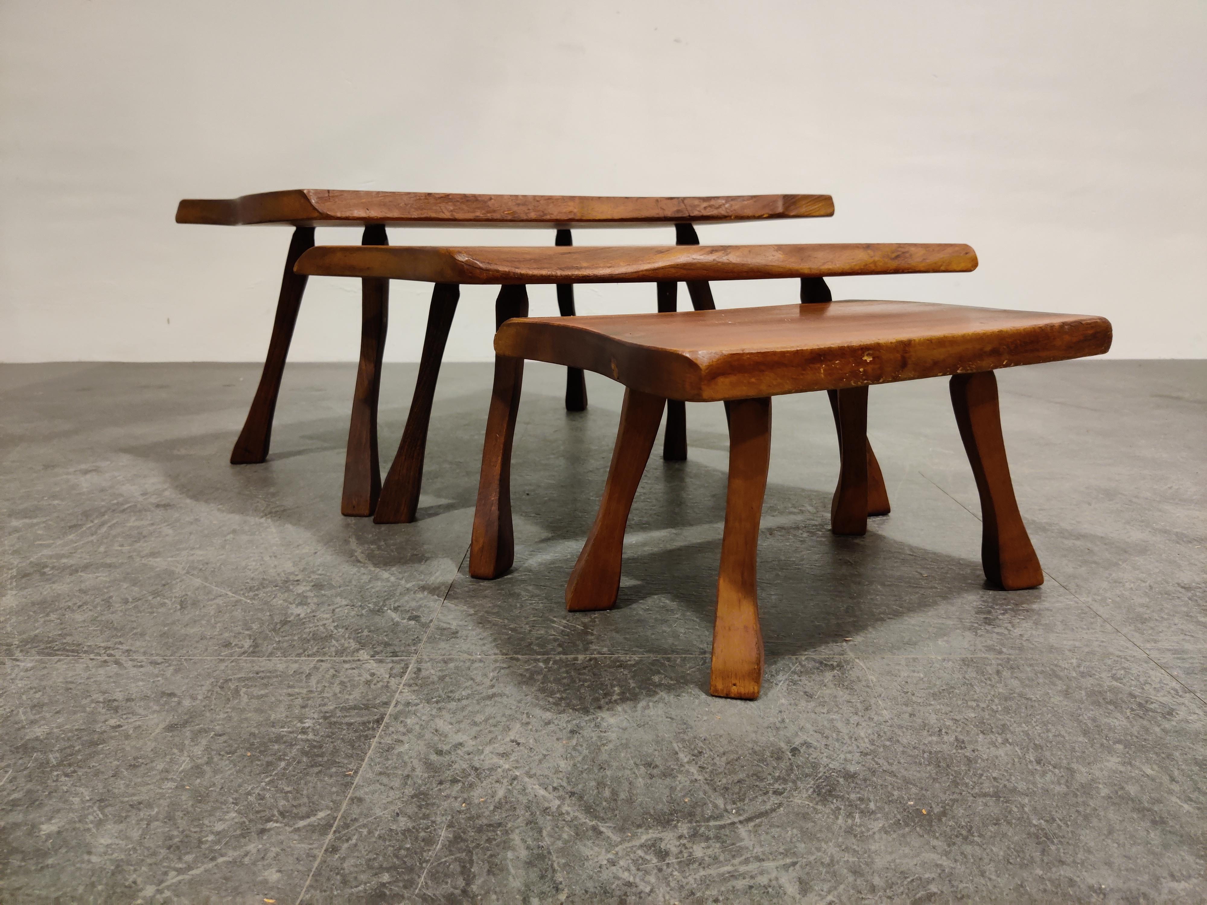 Lovely set of unusual brutalist nesting tables.

SImple and robuste design.

1960s - Belgium

Good condition

Dimensions of the largest table:

Height 29cm/11.41