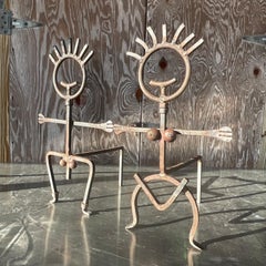 Vintage Brutalist Patinated Man and Woman Andirons - a Pair