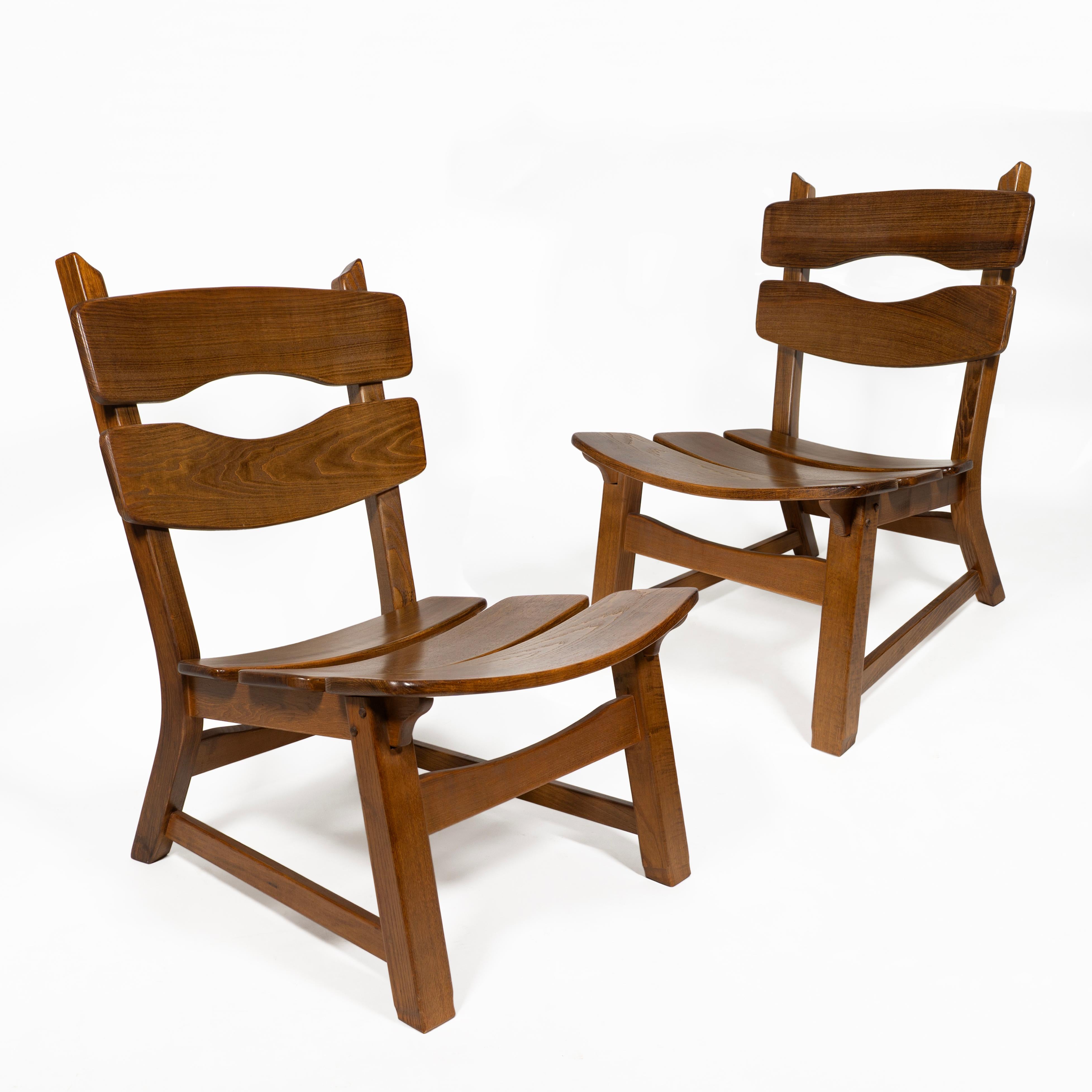 Timelessly beautiful set of six lounge chairs and three side tables designed by Dittmann & Co for AWA in the 1960s. 
Everything is made from stained solid oak, which is characterised by a robust construction and a warm, natural finish that
