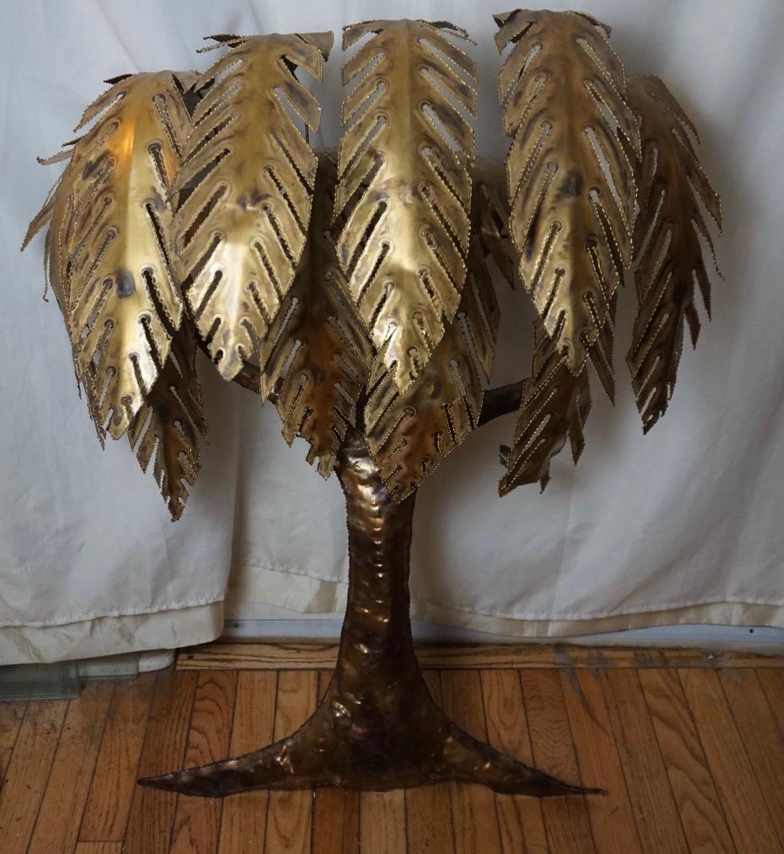 Be gentle as the leave can be manipulated, which adds to this sculpture's appeal. If you a have bamboo or rattan furniture, this would compliment beautifully. Made of bamboo, wood, metal and brass, circa 1970s.