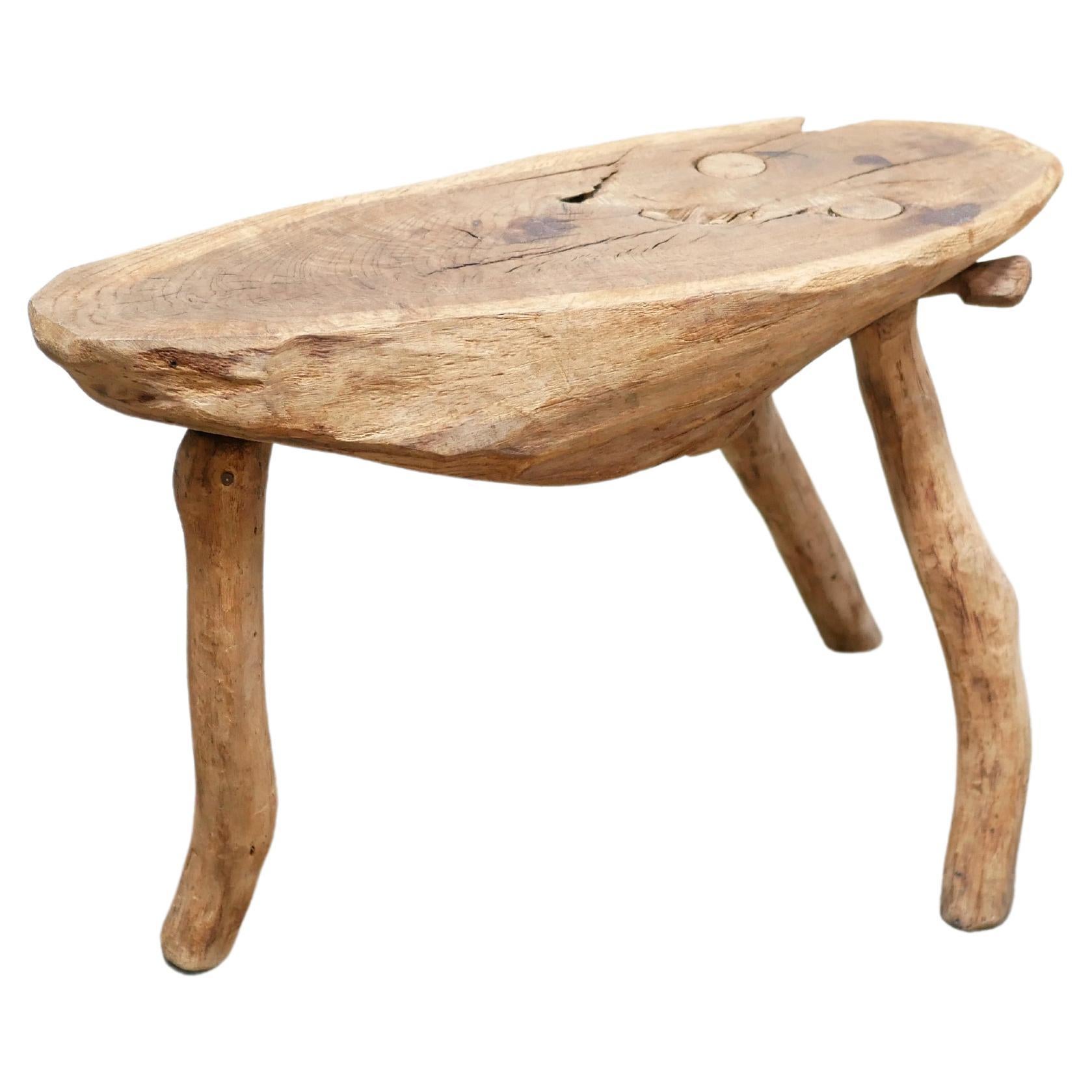 Vintage brutalist wooden tripod side table For Sale