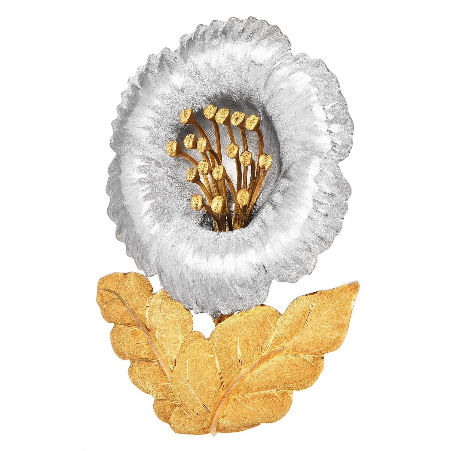 Opulent, Sophisticated, and Highly collectible describe this extraordinary Flower Buccellati Brooch. 

This piece was crafted in 29.2 Grams of luxurious 18K Yellow & White Gold, with a textured satin finish simulating the texture of a flower and its