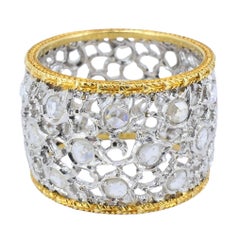 Anillo vintage Buccellati de oro bicolor de 18 quilates con diamantes en obra abierta
