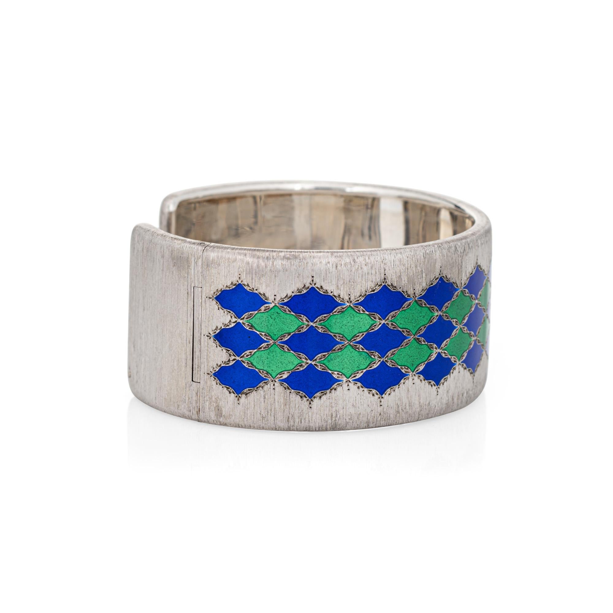 Stylish and finely detailed vintage Buccellati enamel cuff bracelet, crafted in sterling silver (circa 1970s).  

Vibrant blue and green enamel adorns the classic cuff within a renaissance style design motif. The intricate surface is silky to the