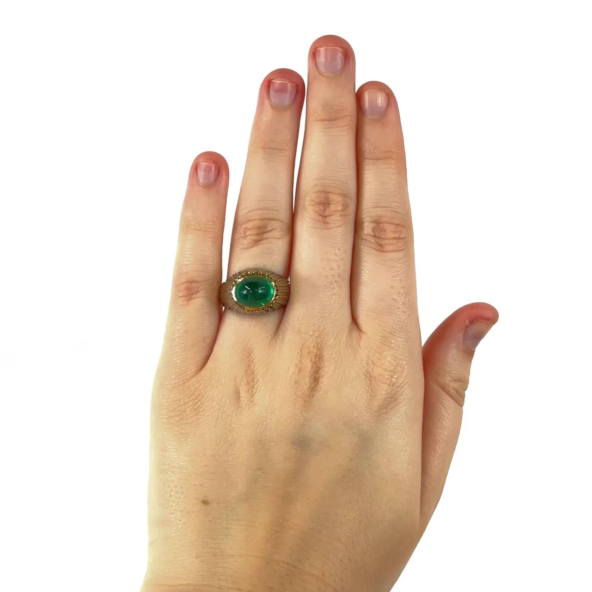 One Vintage Buccellati GIA 4.90 Carat Zambian Emerald Cabochon Bezel Set 18 Karat Gold Ring. Featuring one GIA certified double cabochon weighing approximately 4.90 carats, accompanied with certificate #5221268942 stating the emerald is of Zambian