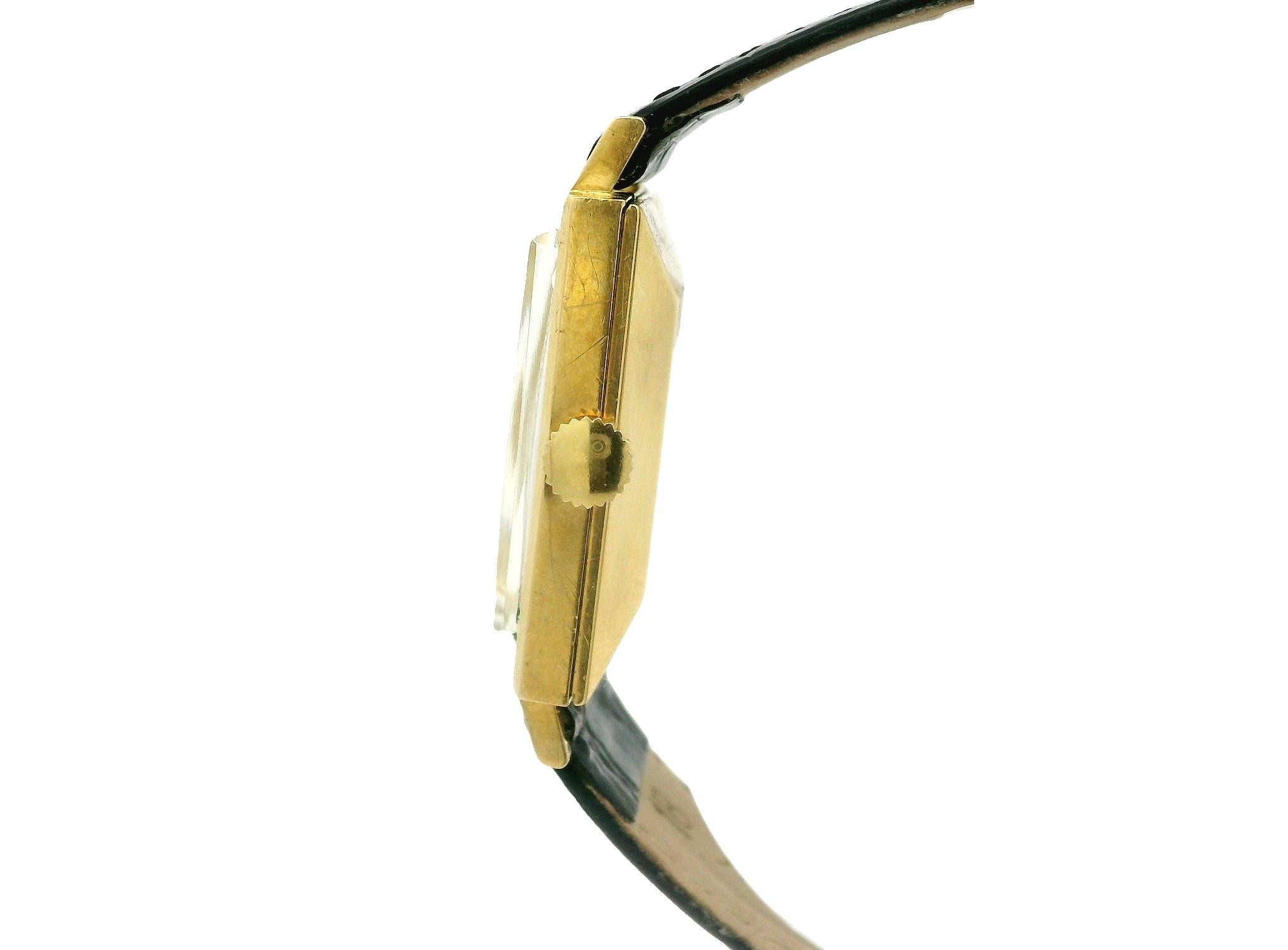 Watchmaker:	Bucherer
Movement:	Mechanical - Automatic - 17 jewels - Swiss Made
Case Material:	Solid 18k Yellow Gold
Gross Weight:	25.8 Grams (including case, movement, and strap)
Case Width:	26mm (not including crown)
Case Height:	36.9mm (lug to