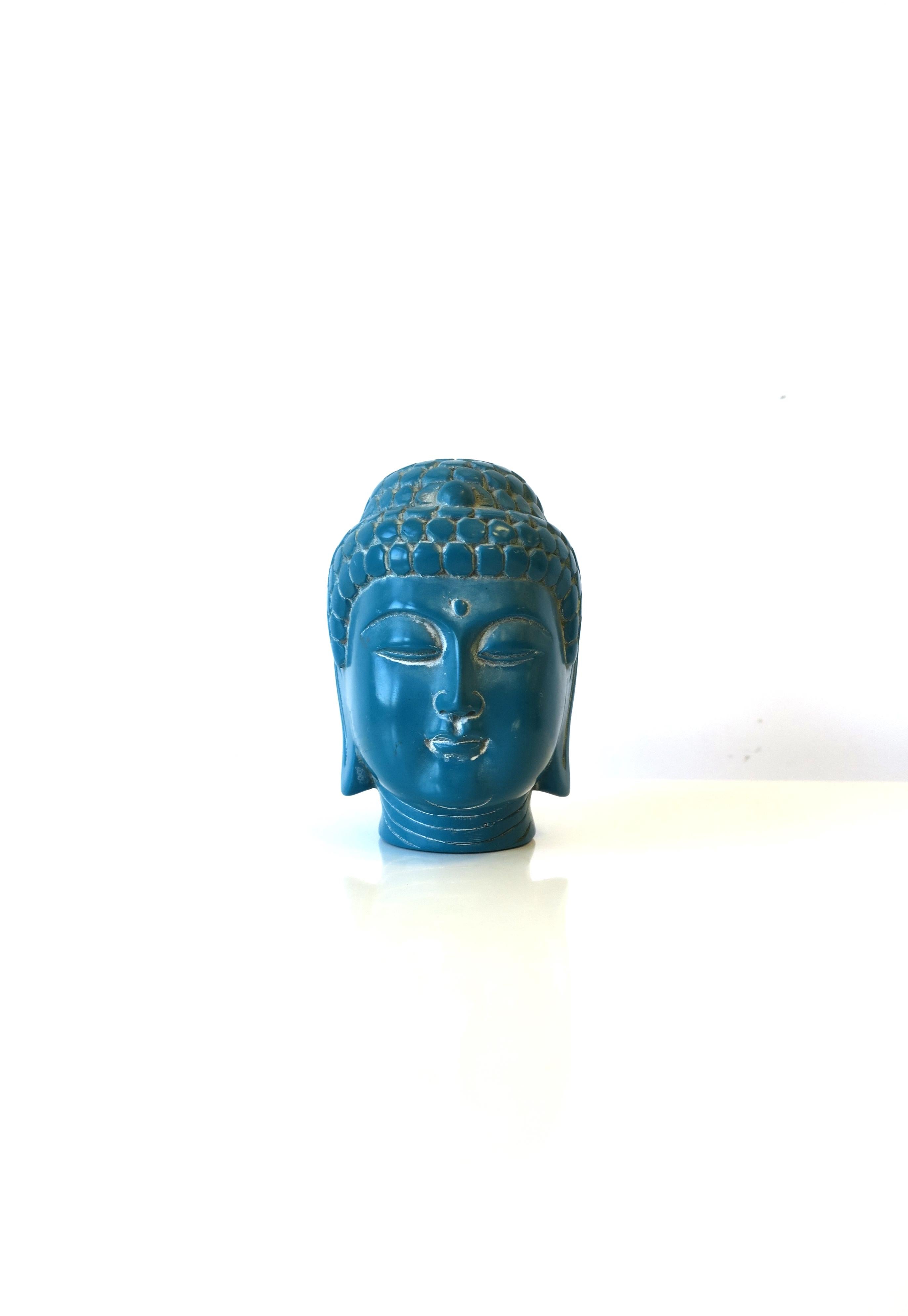 A substantial vintage teal blue resin Buddha head bust sculpture decorative object, circa late-20th century, 1980s, 1990s. A great desk, nightstand, bookshelf, etc., object. Dimensions: 4