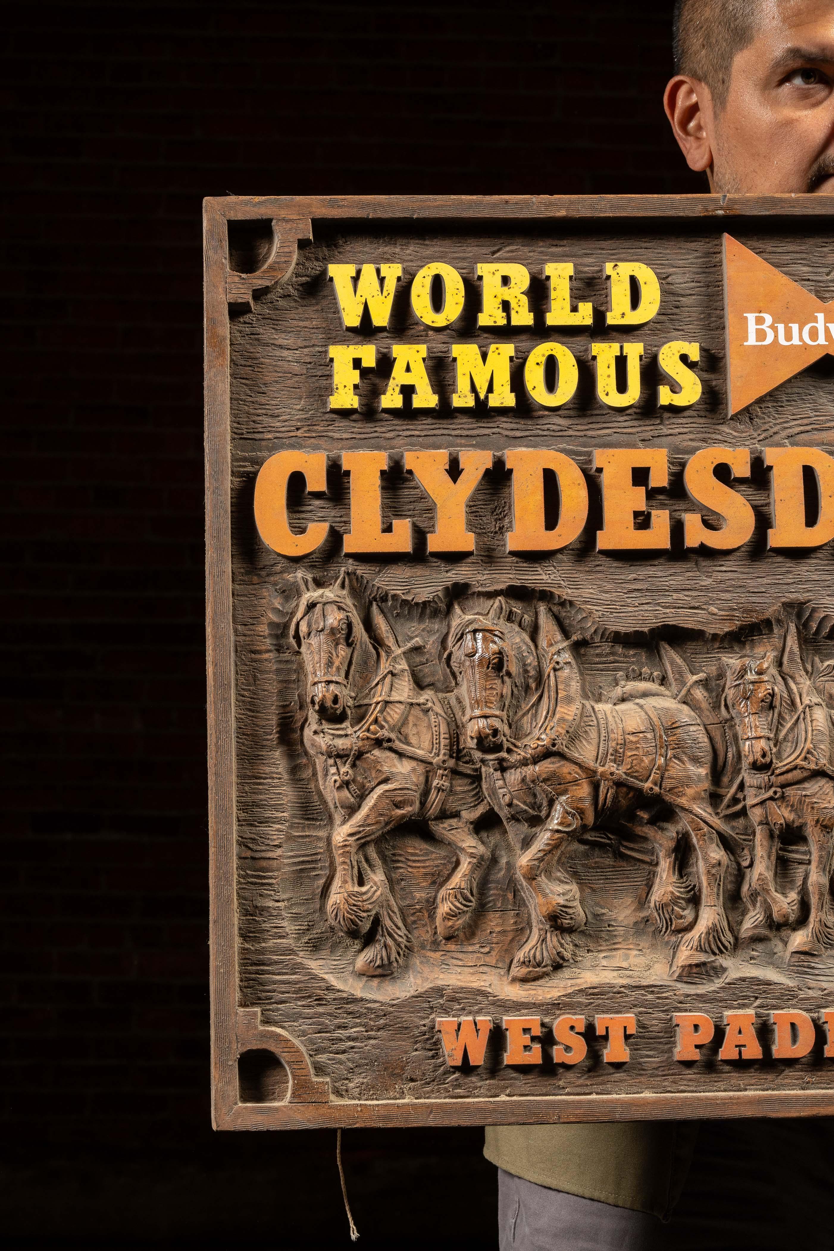 c. 1988; Santa Anita Park - Arcadia, California

Plastic promotional sign for the West Paddock Gardens at Santa Anita Racetrack.

This colorful sign features a stylized and dimensional depiction of the iconic Budweiser Clydesdales pulling the