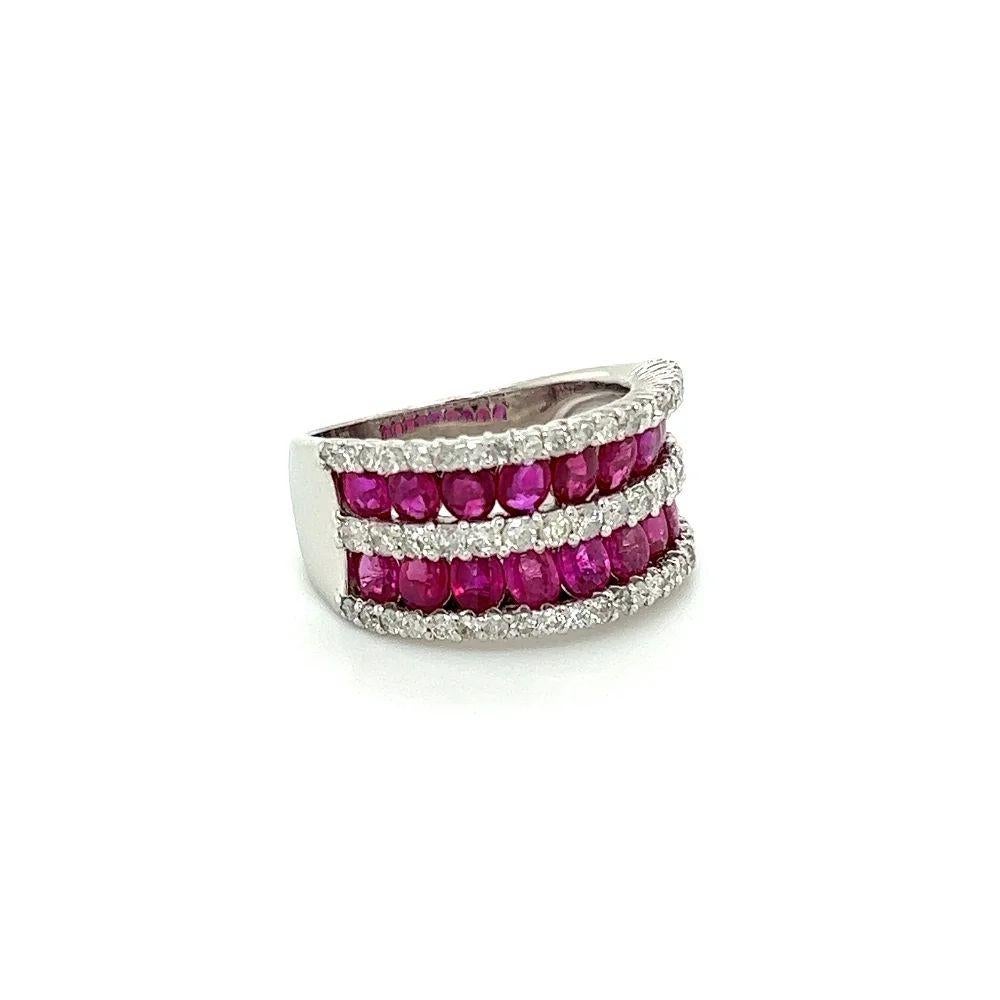 Simply Beautiful! Ruby and Diamond Platinum 11.30mm Band Ring. Hand set with Double row of Buff Top Rubies, weighing approx. 4.00tcw and Double row of Brilliant cut Diamonds, approx. 0.90tcw. Hand crafted Platinum mounting. Ring size 6.25. The ring
