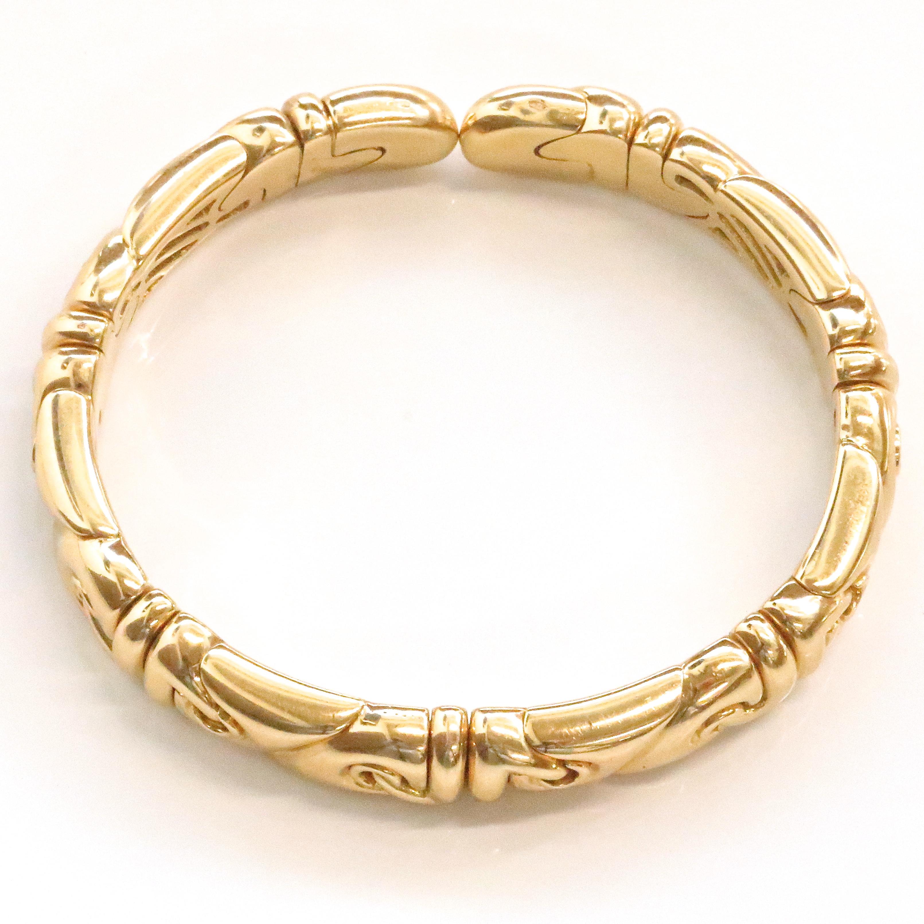 The iconic Bulgari Cuff bracelet is the perfect addition to your signed jewelry collection. You can't go wrong with classic yellow gold especially since solid gold pieces have been a hot trend lately. Vintage Bulgari 18k Gold Cuff Bangle. Signed