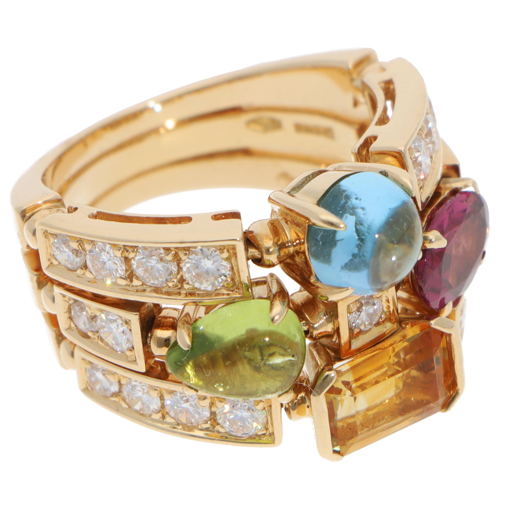 A beautiful vintage Bulgari Allegra multi-gemstones and diamond ring set in 18k yellow gold, circa 2010-2020. 

From the Allegra collection, the ring features an emerald-cut citrine, a pear-shaped cabochon tourmaline, a round cabochon topaz and an