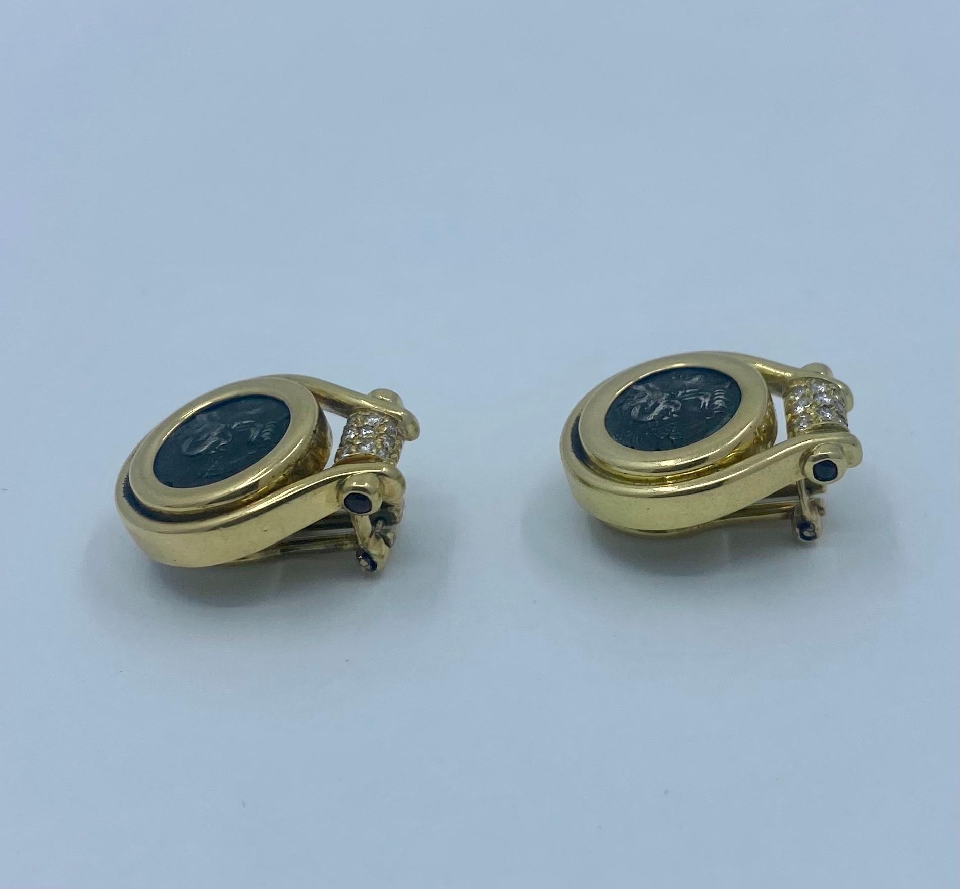 Designer: Buldari
Materials: 18 karat Yellow Gold
Gemstone: 0.2 cts.  round brilliant cut diamond
Weight: 18.8 grams
Measurement: 3/4