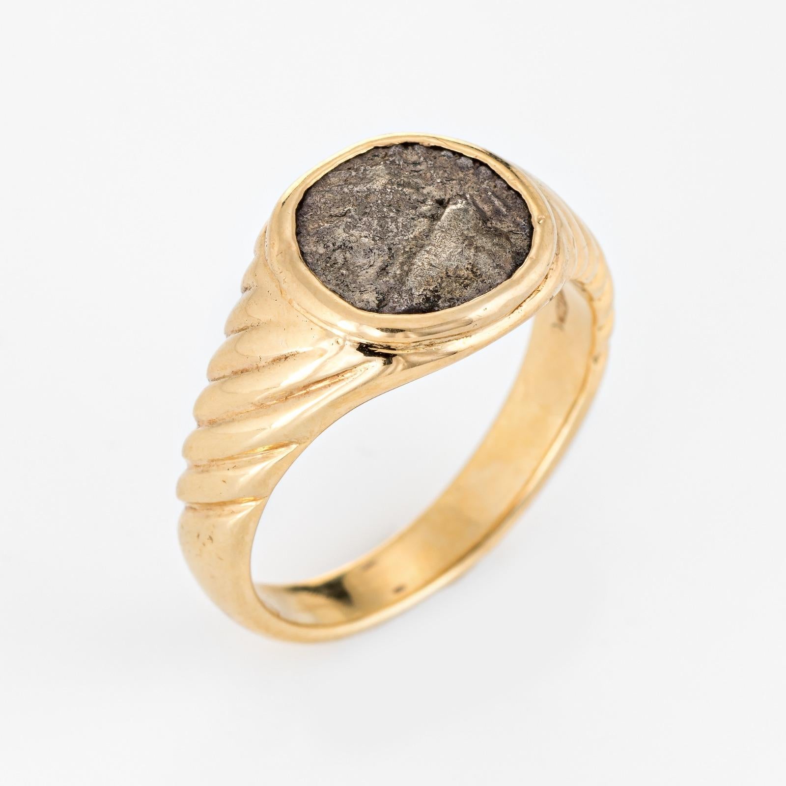 Stylish vintage Bulgari ancient coin ring crafted in 18 karat yellow gold (circa 1970s to 1980s).

The iconic coin ring was created by Bulgari back in the 1960s. The enduring 'Monete' design is very popular to this day with Bulgari recently