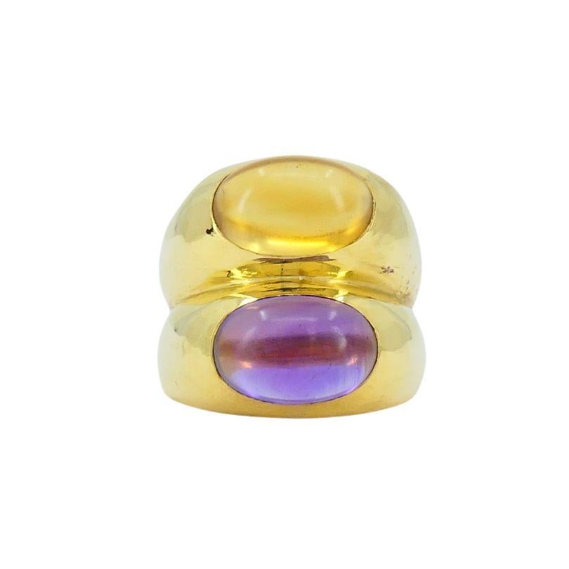 This Bvlgari ring from the 1990s is part of the brand’s iconic Doppio collection. Crafted in 18k yellow gold, the ring showcases a bold, contemporary design that reflects Bvlgari’s signature style. It features two cabochon-cut gemstones—a rich